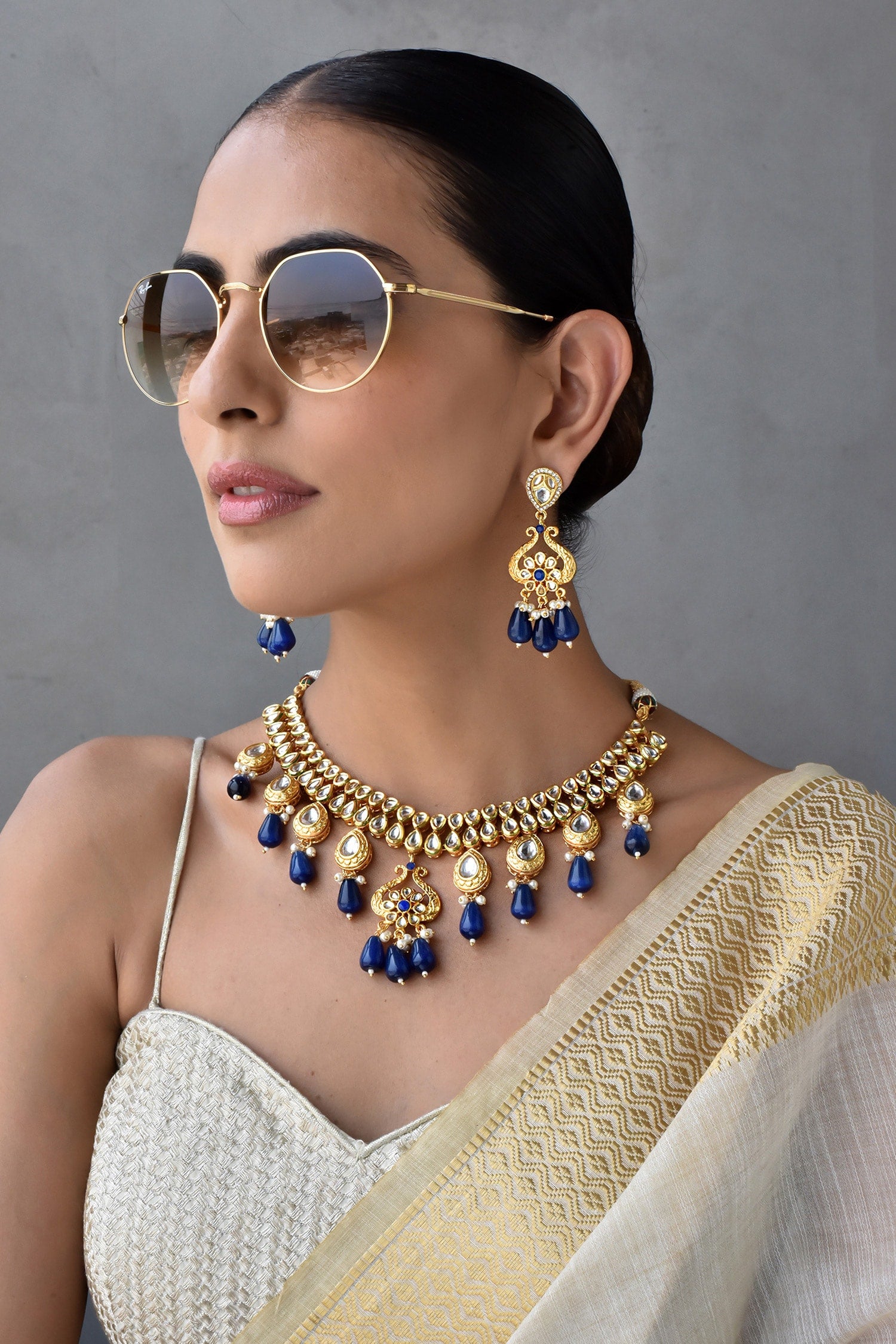 Flower Carved Kundan Embellished Jewellery Set 