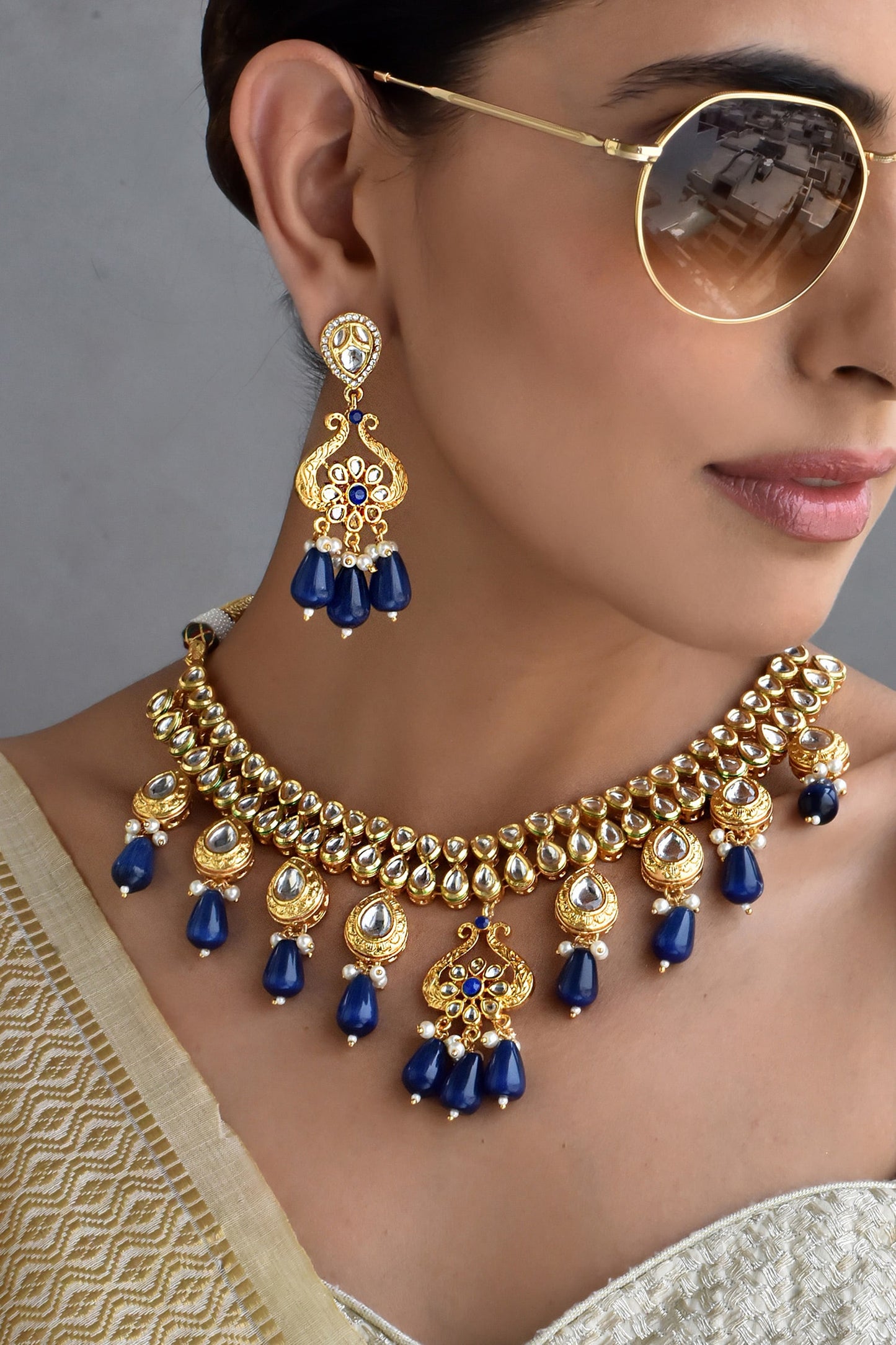Flower Carved Kundan Embellished Jewellery Set 
