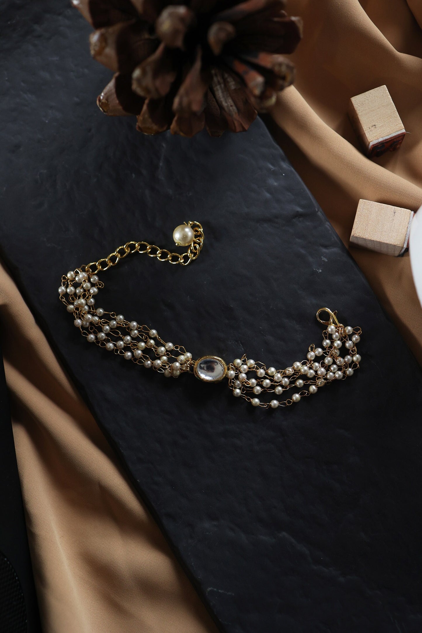 Kundan Embellished Multi Strand Bracelet 