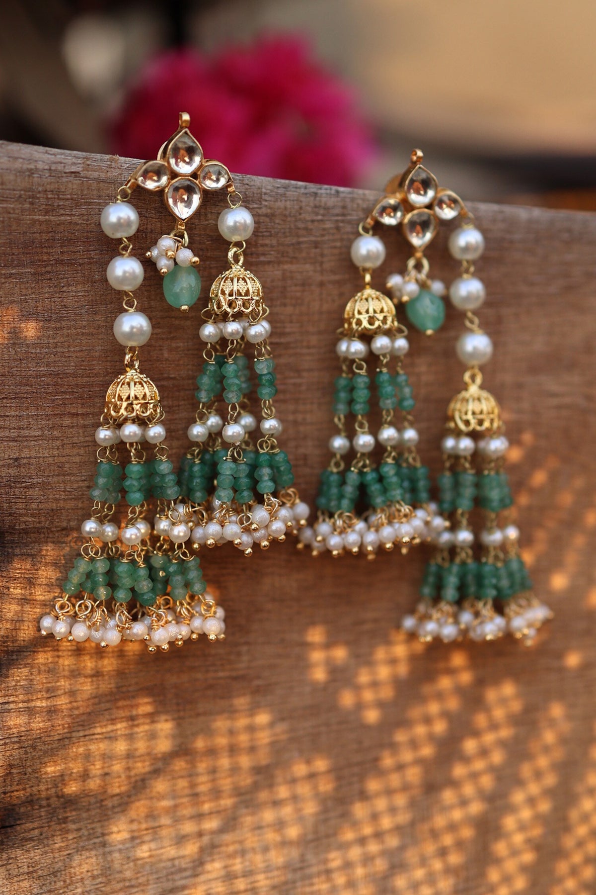 Shell Pearl Embellished Jhumkas 