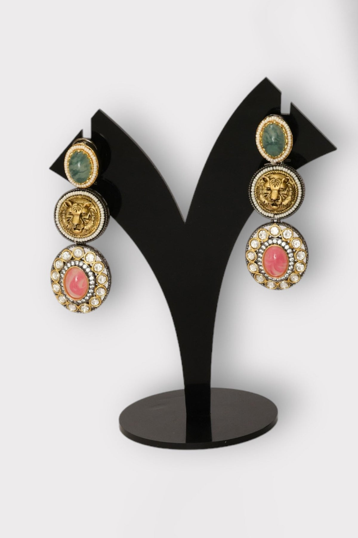 lLioness Carved Stone Studded Earrings 