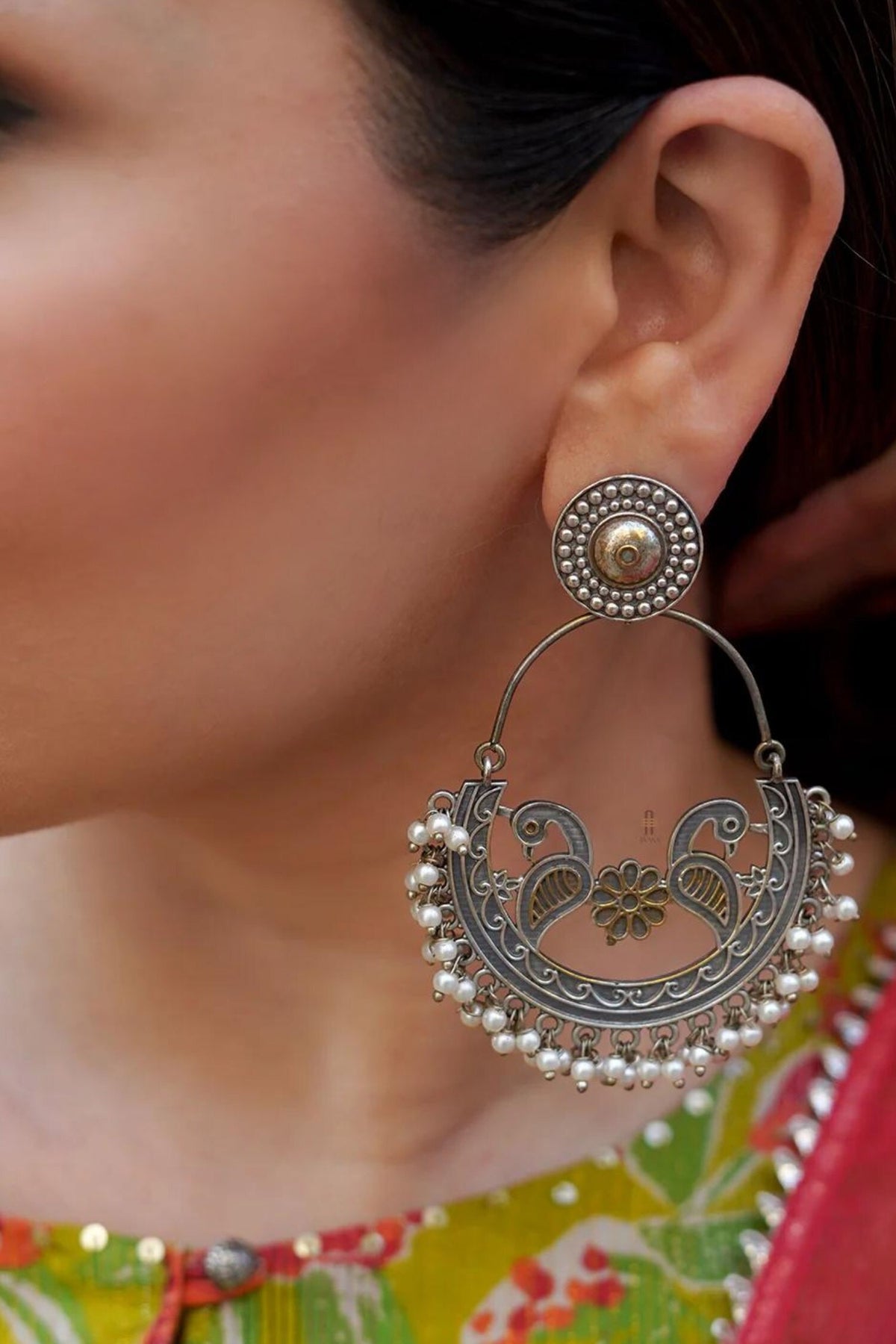 Triveni Peacock Carved Earrings 