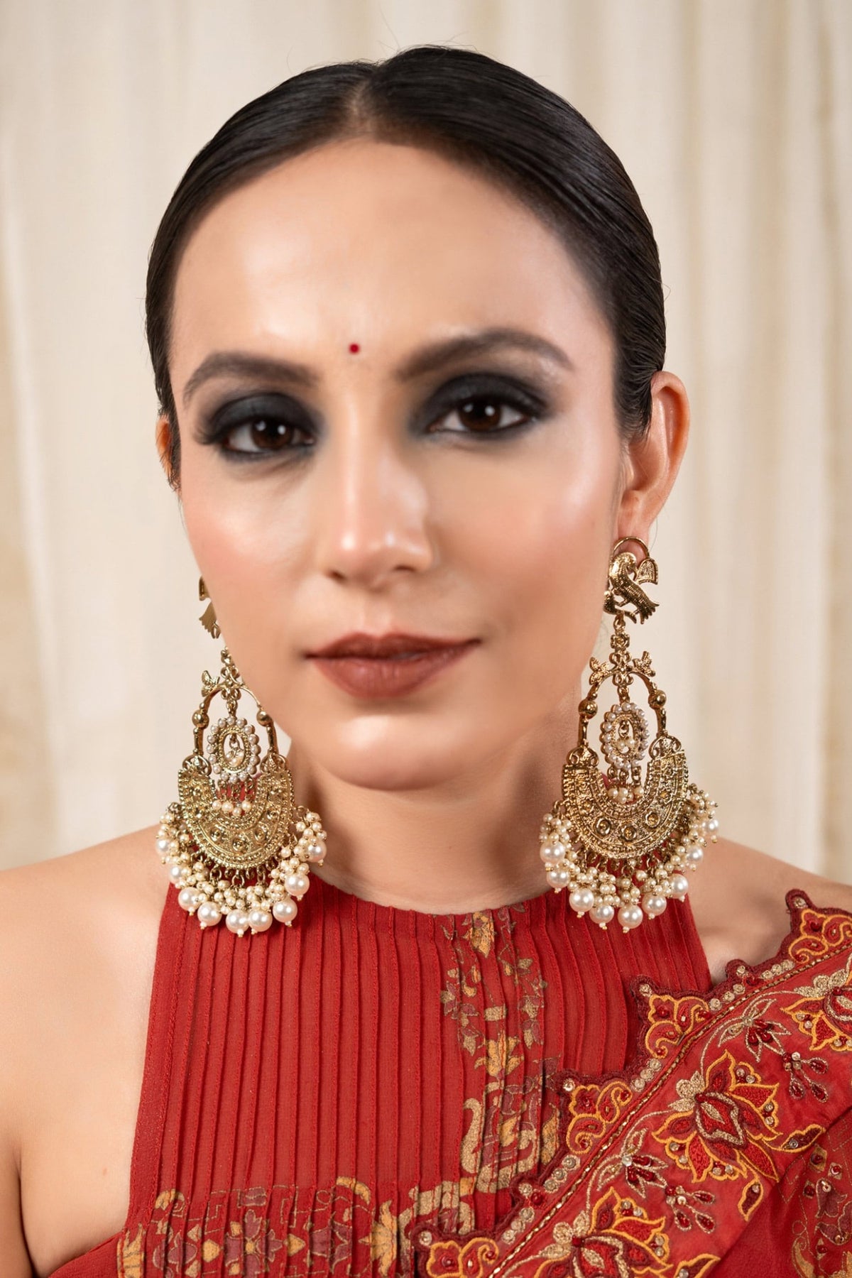 Yukta Kundan Work Temple Earrings 