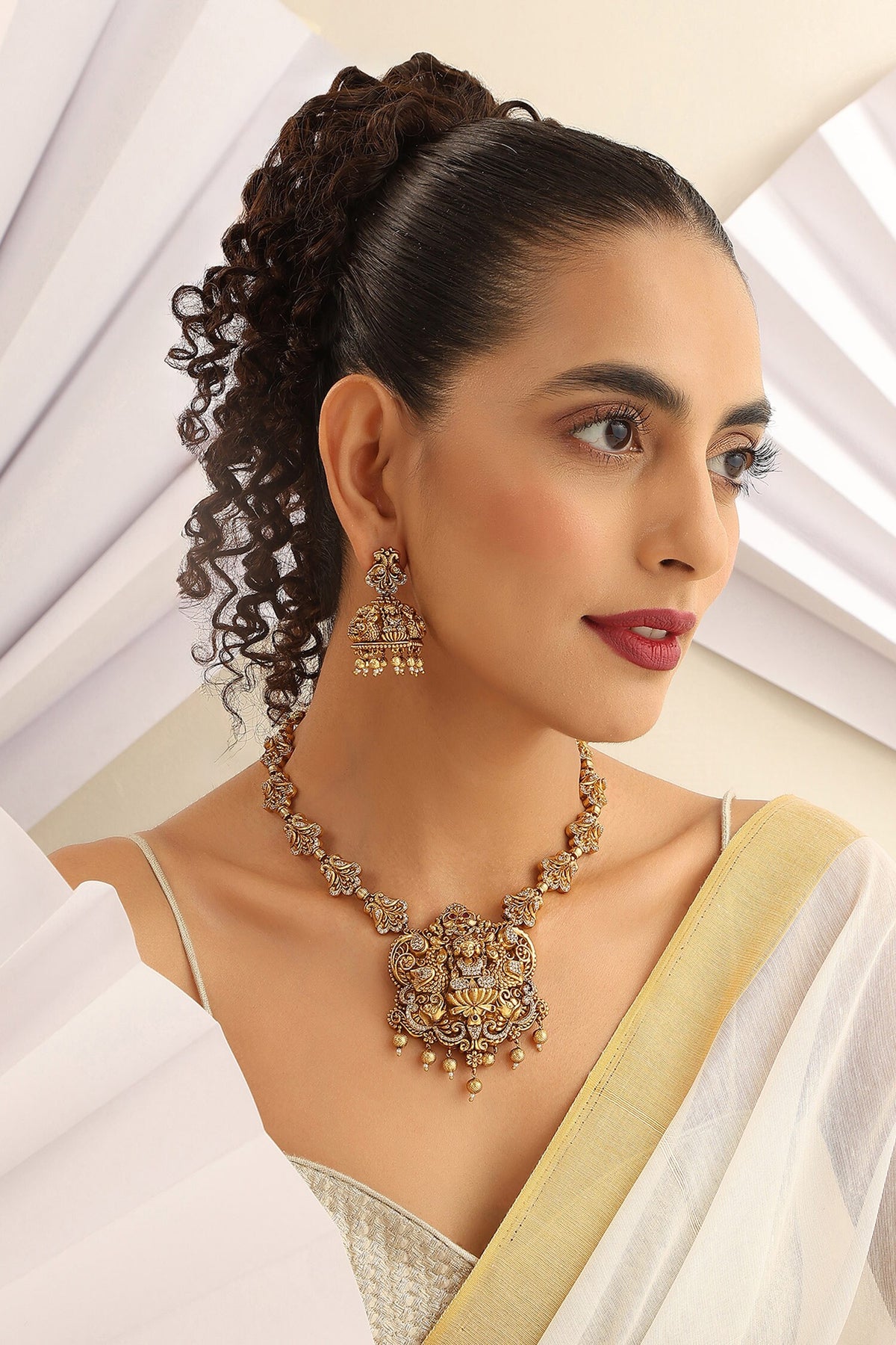 Deity Studded Hasli Necklace Set 
