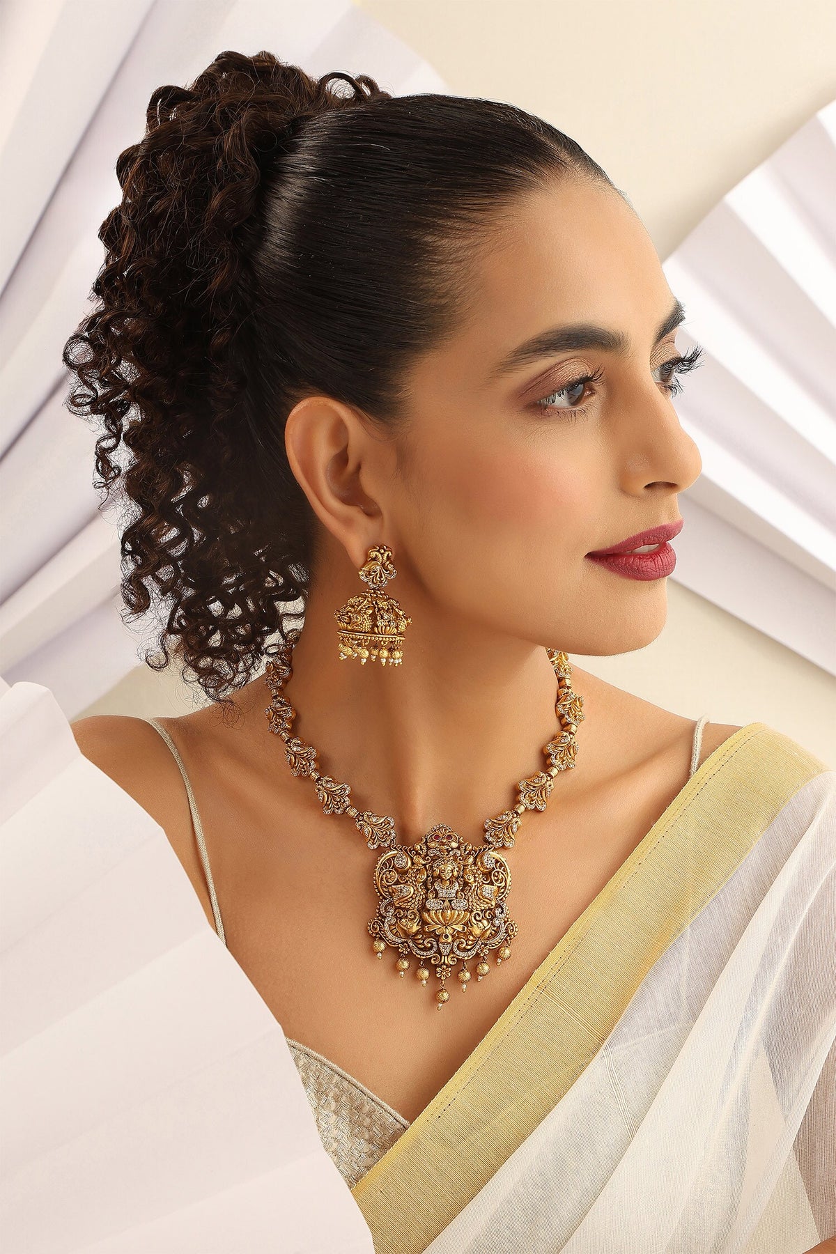 Deity Studded Hasli Necklace Set 