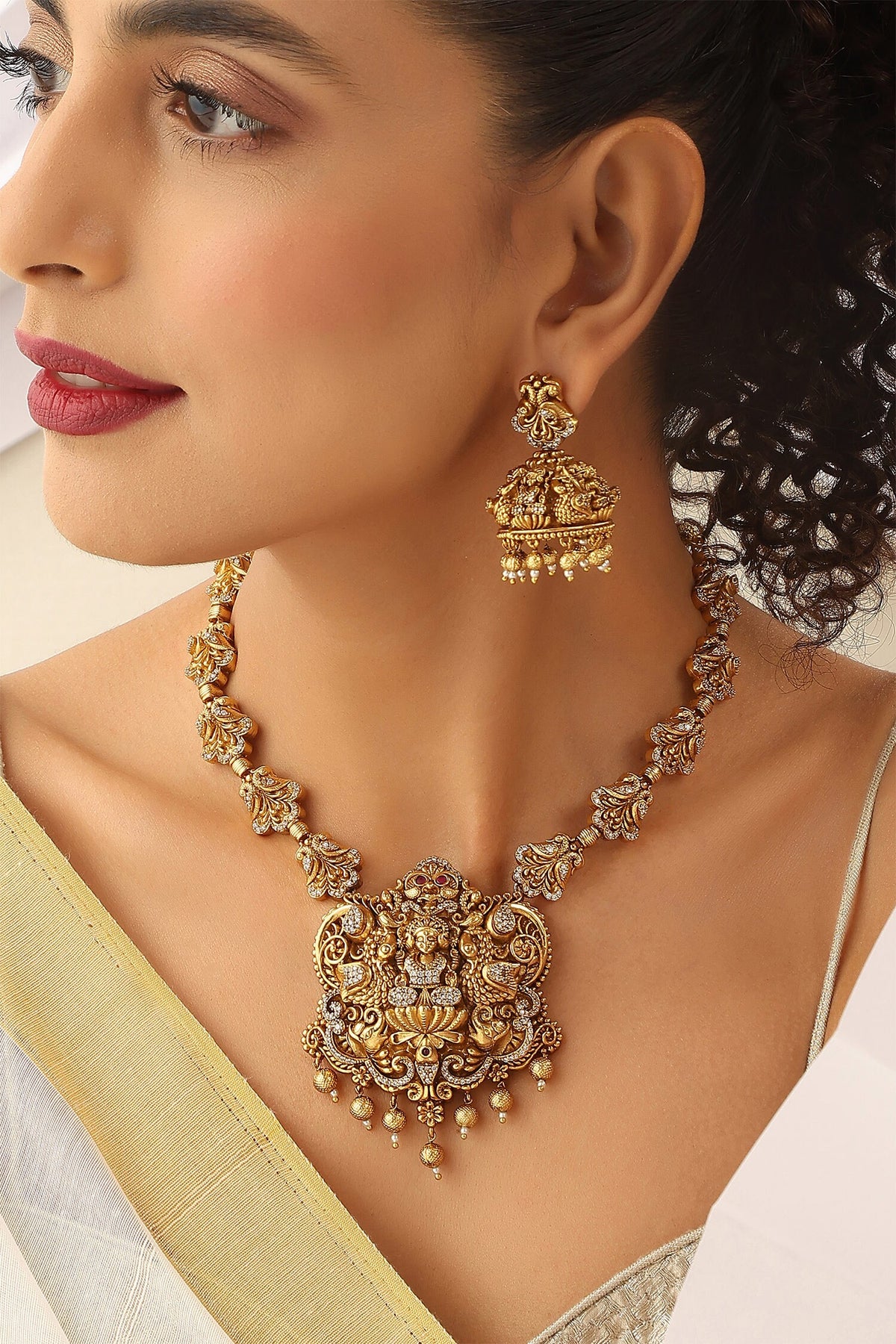 Deity Studded Hasli Necklace Set 