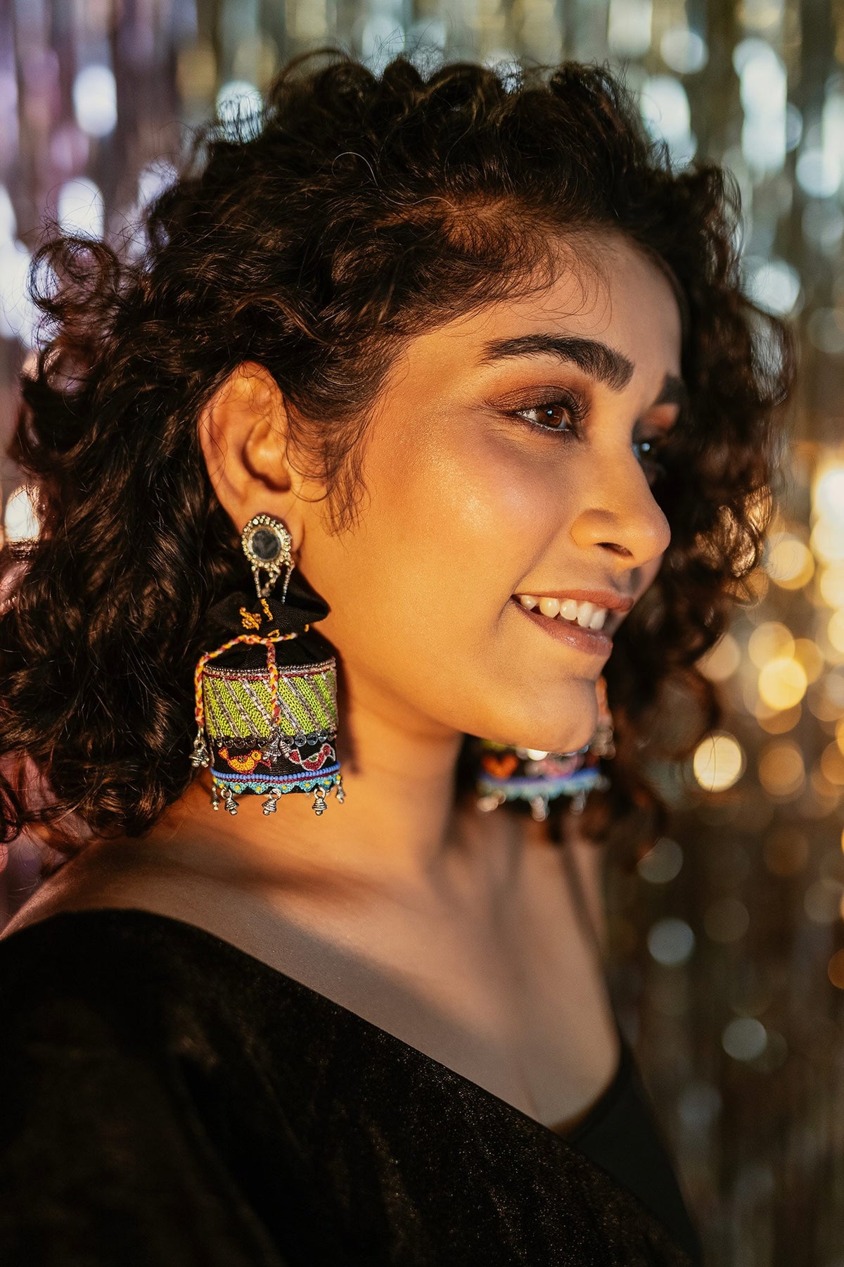 Kaala Khatta Thread Embroidered Potli Jhumkas 