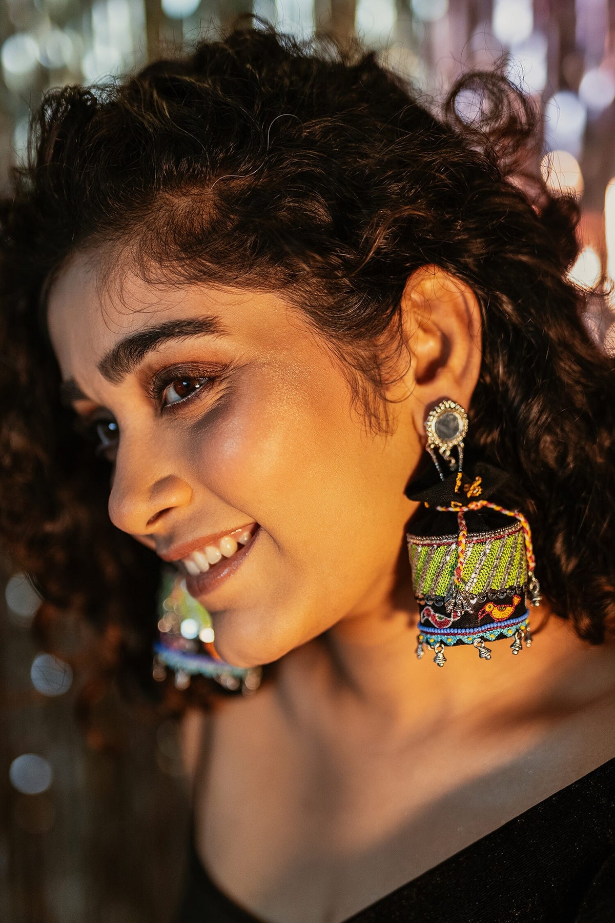 Kaala Khatta Thread Embroidered Potli Jhumkas 