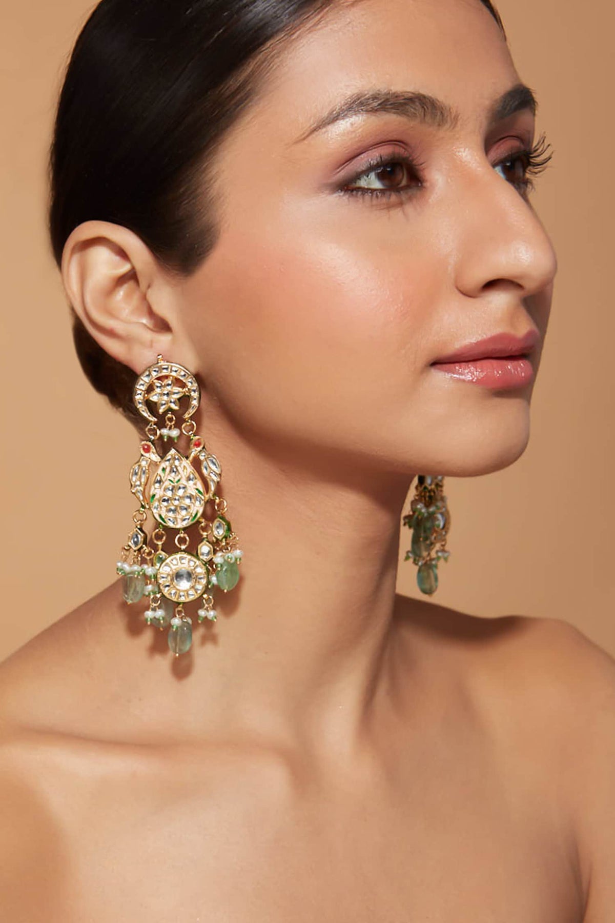 Tear Drop Carved Kundan Embellished Earrings 