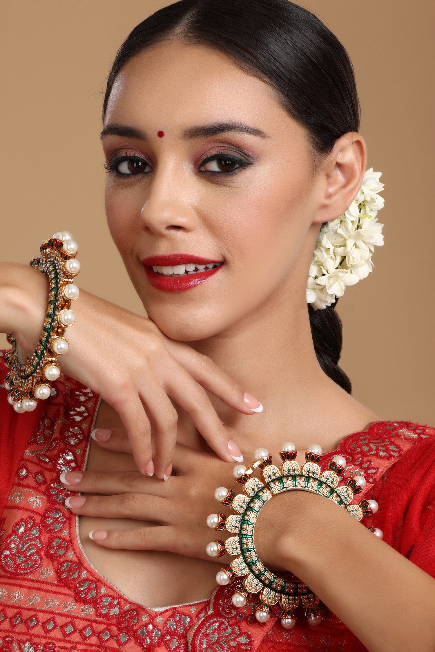 Gold Toned Pearl Encrusted Meenakari Bangles 