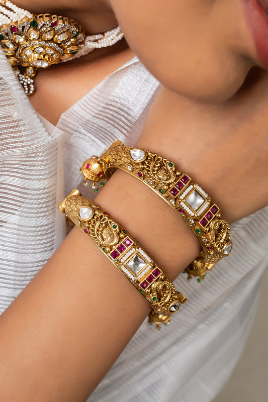 Gold Plated Carved Bangle With Stones 