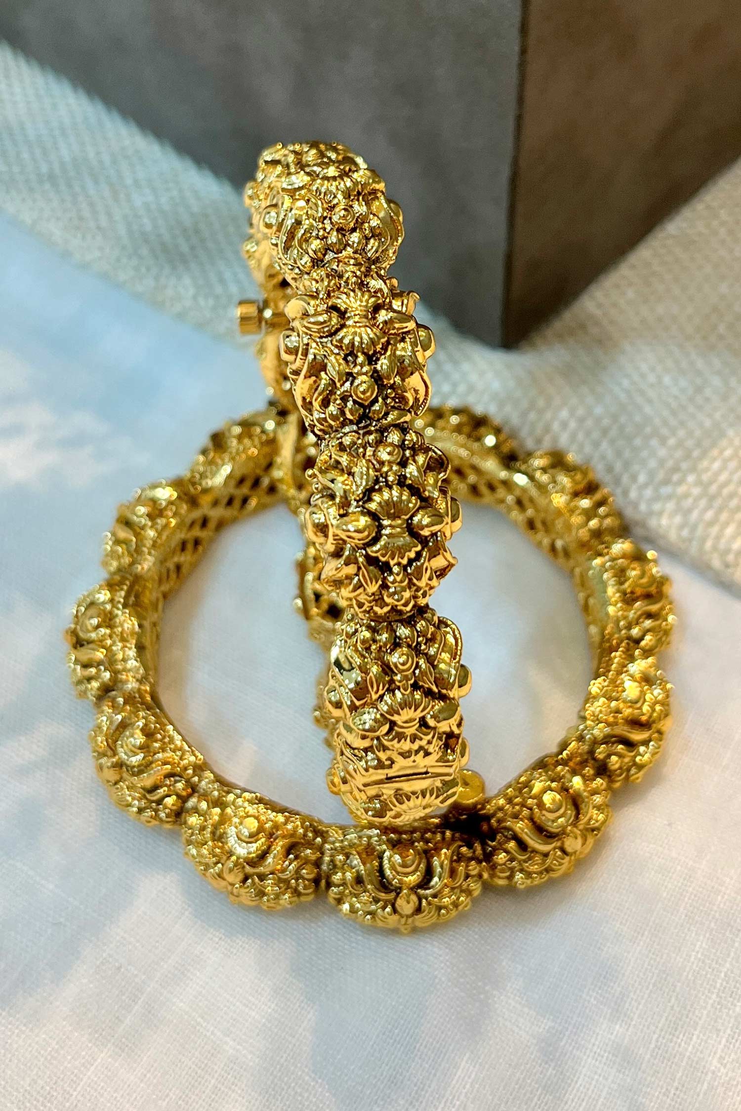 Gold Finish Carved Temple Bangle Set 