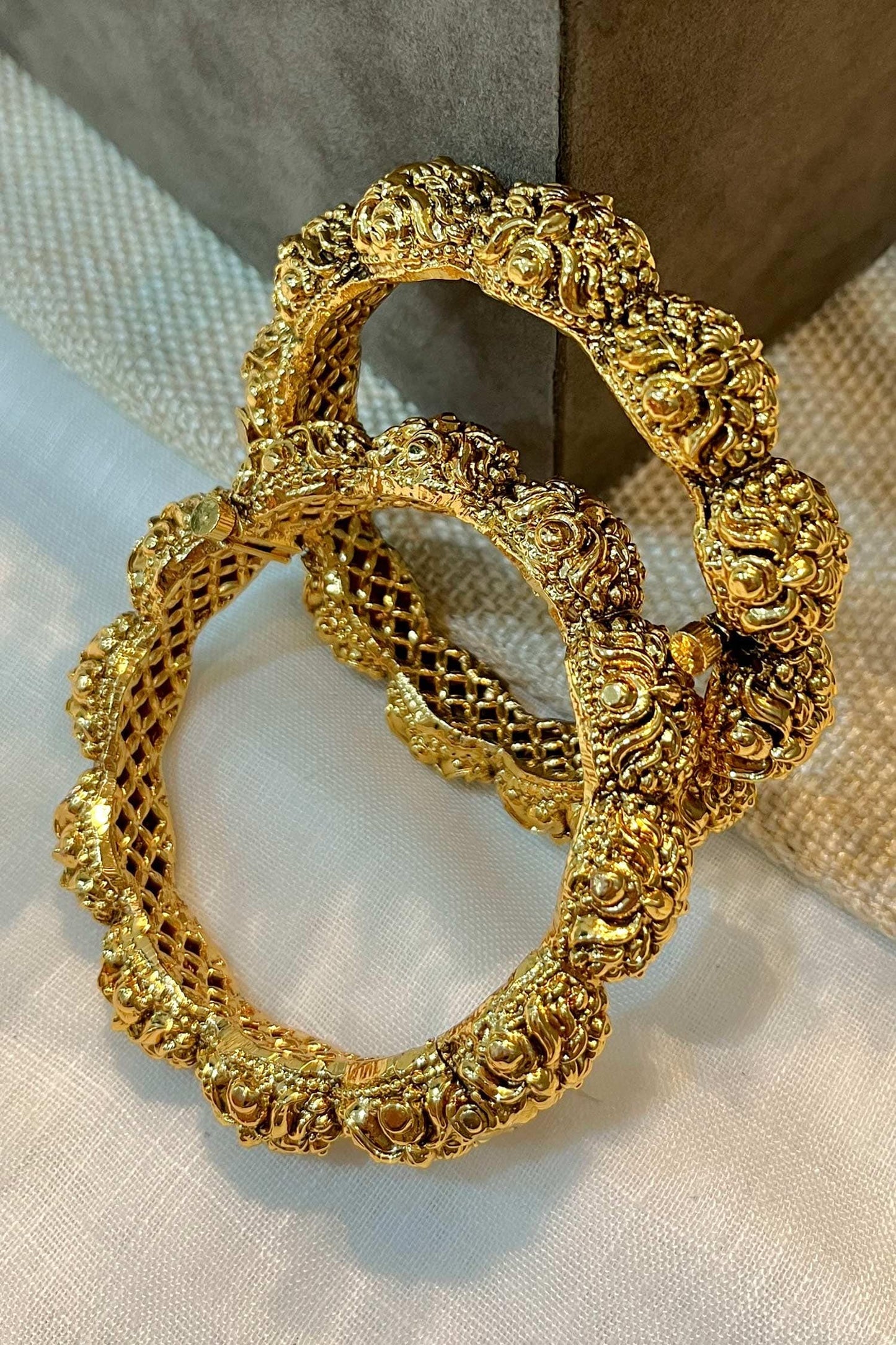 Gold Finish Carved Temple Bangle Set 
