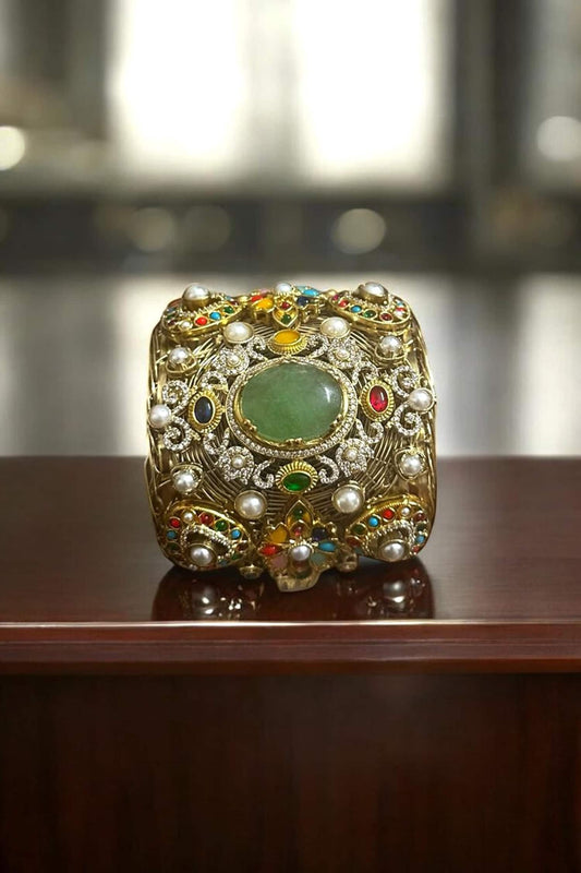 Jewel Of Nine Suns Handcuff Bracelet 