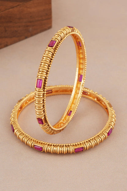 Antique Carved Ruby Studded Pair of Bangles 