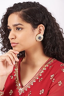 Gold Finish Stud Earrings With Blue Stones