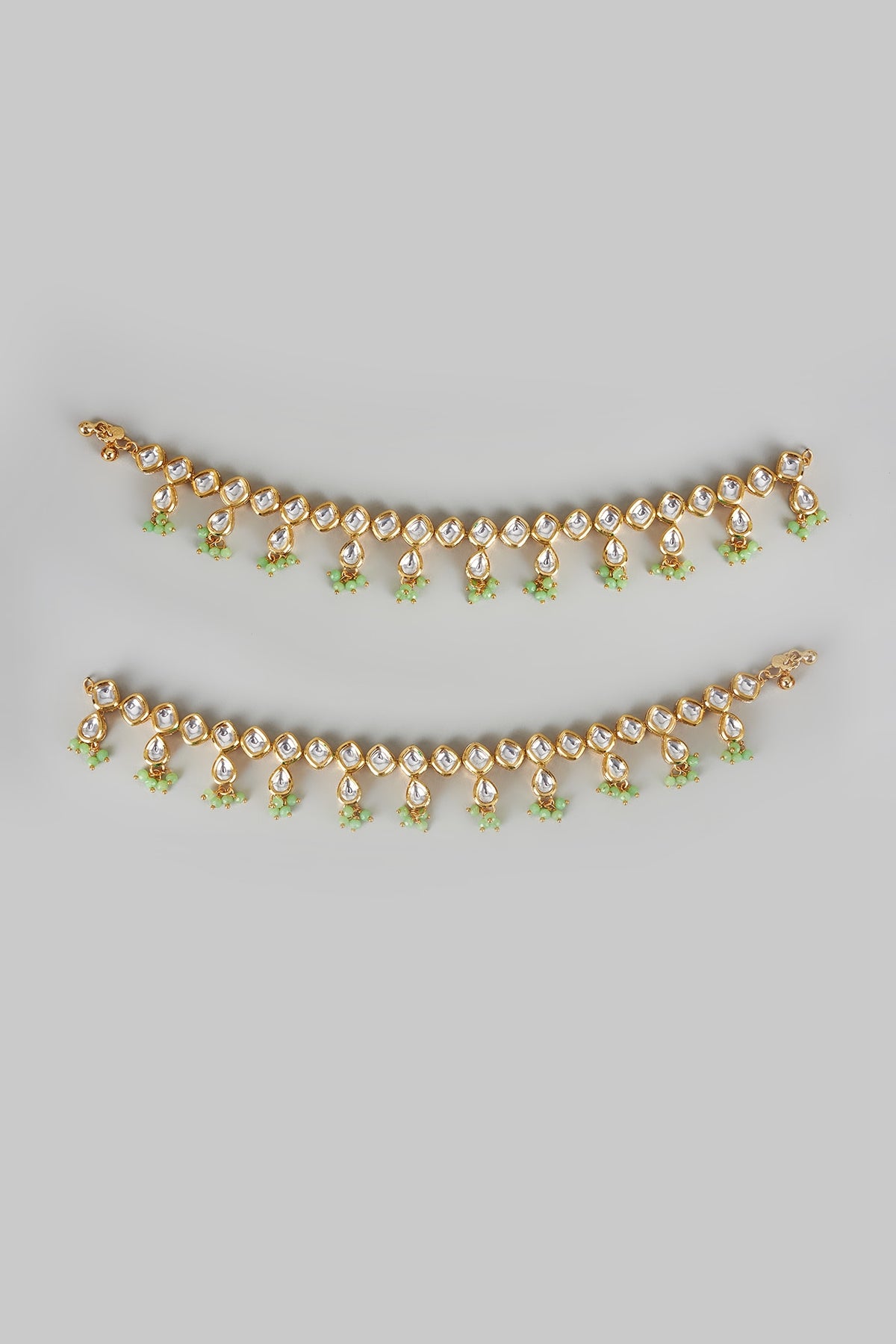Gold Finish Kundan Polki & Olive Green Beaded Anklets (Set Of 2)