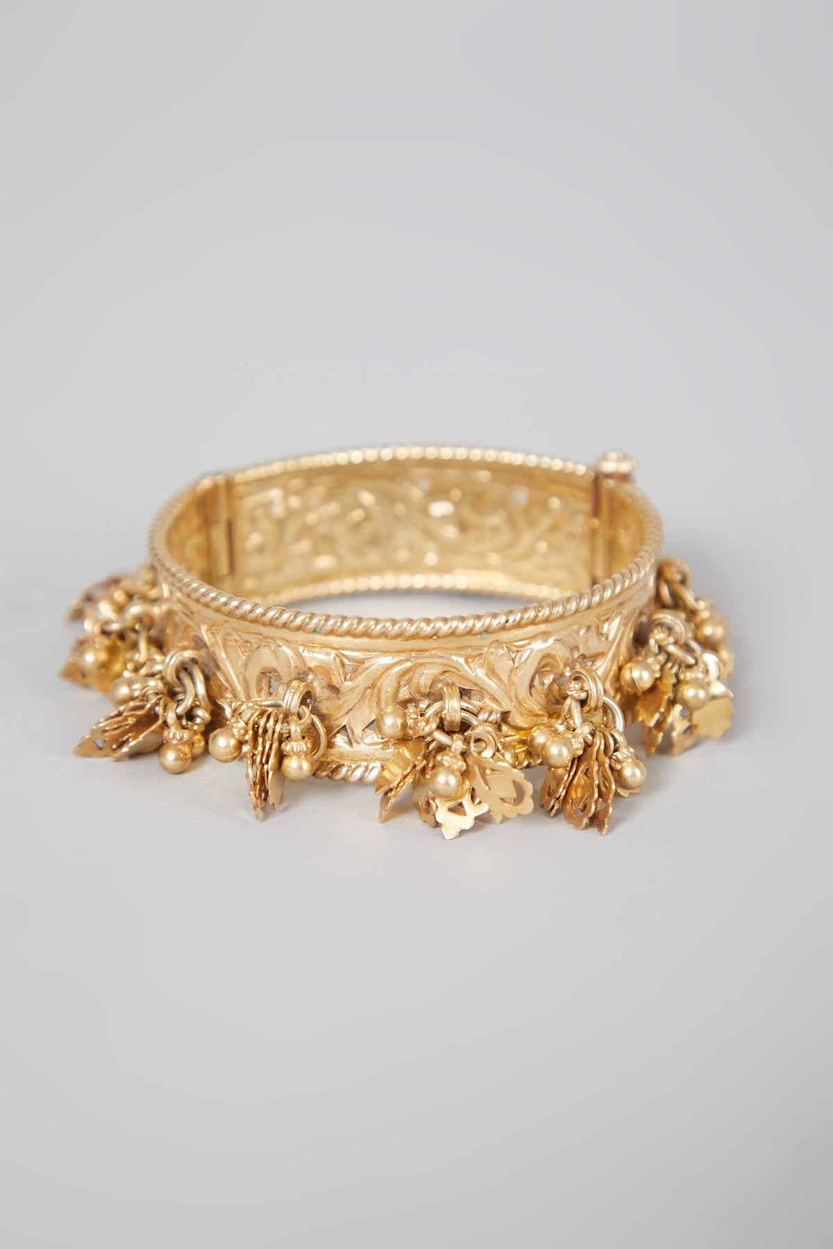 Gold Finish Motif Kada Bangle In Sterling Silver
