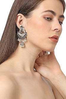 White Finish Blue Stone Stud Earrings In Sterling Silver