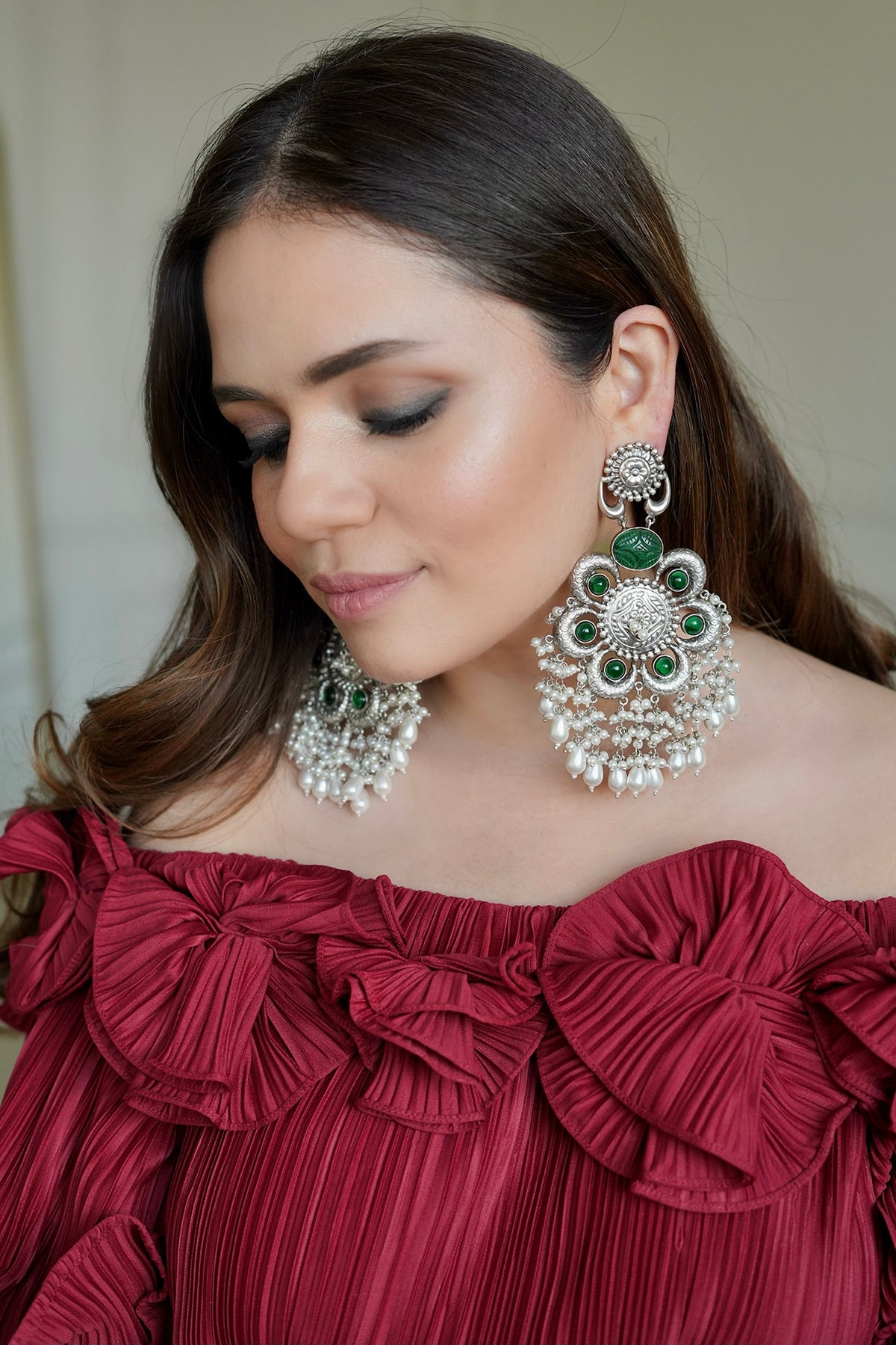 Silver Finish Synthetic Emerald Stone Dangler Earrings