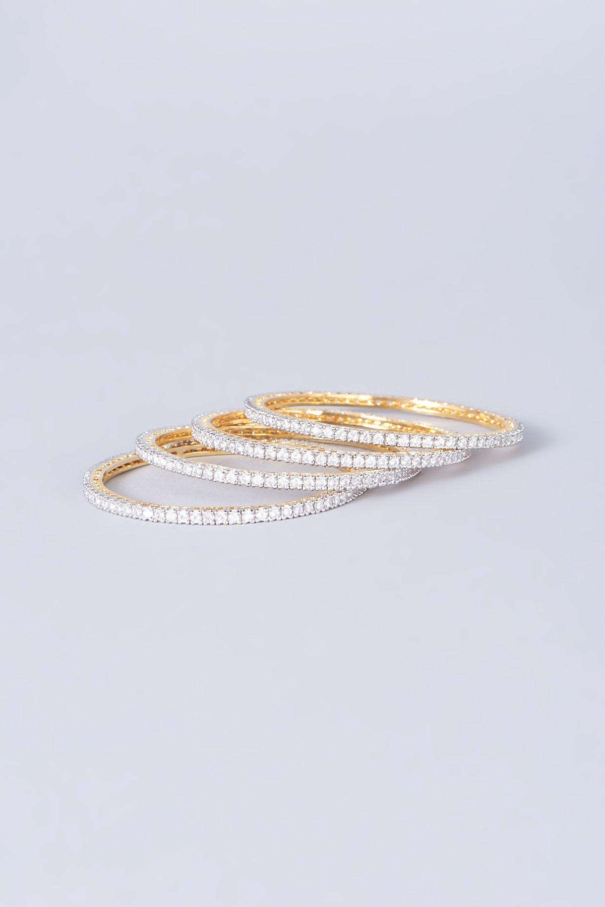 Gold Finish Zircons Bangles (Set of 4)