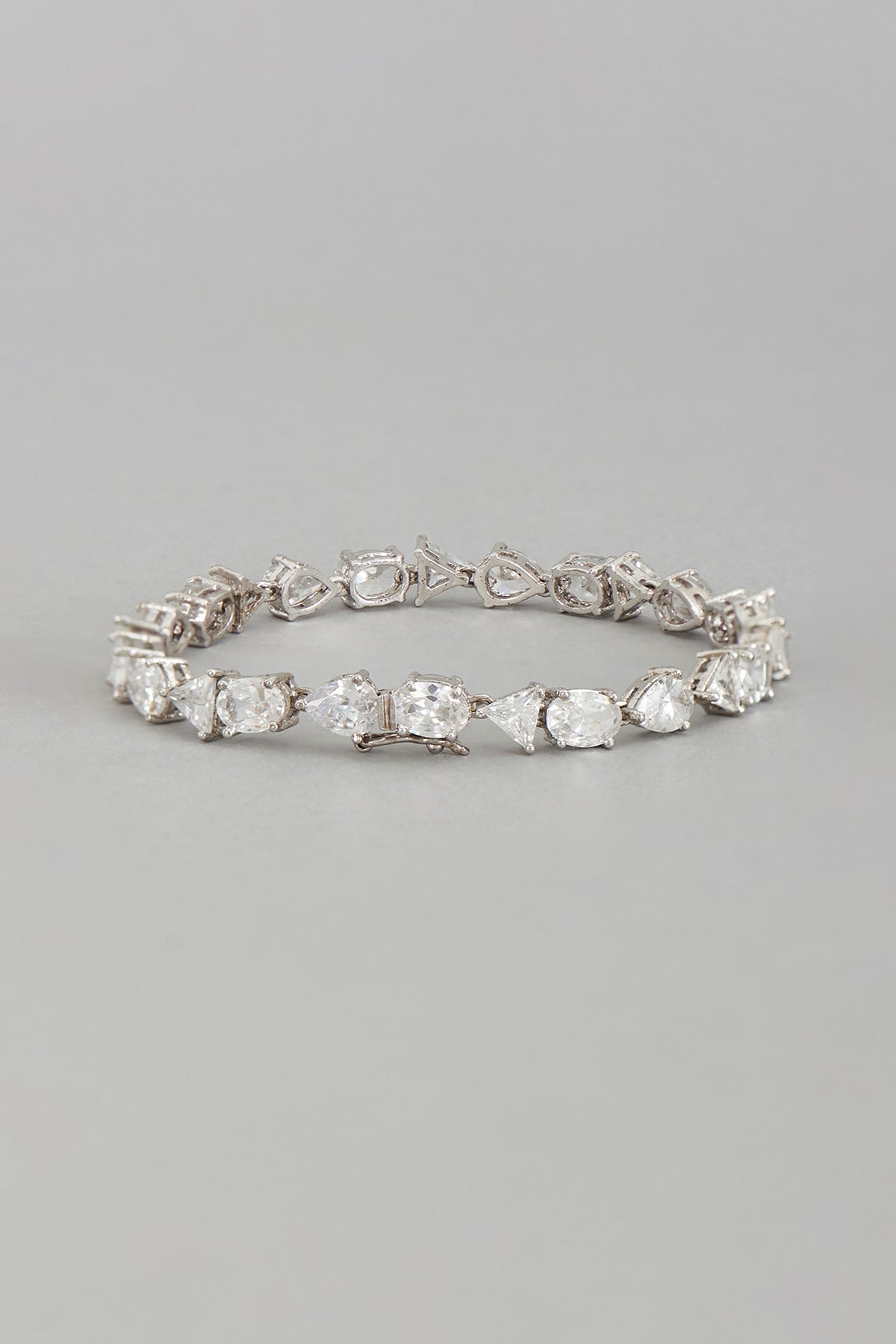 White Rhodium Finish Multi-Shaped Cubic Zirconia Solitaire Bangle