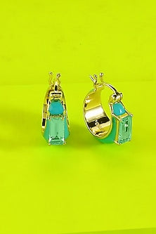 Gold Finish Blue Topaz Huggie Earrings In Sterling Silver