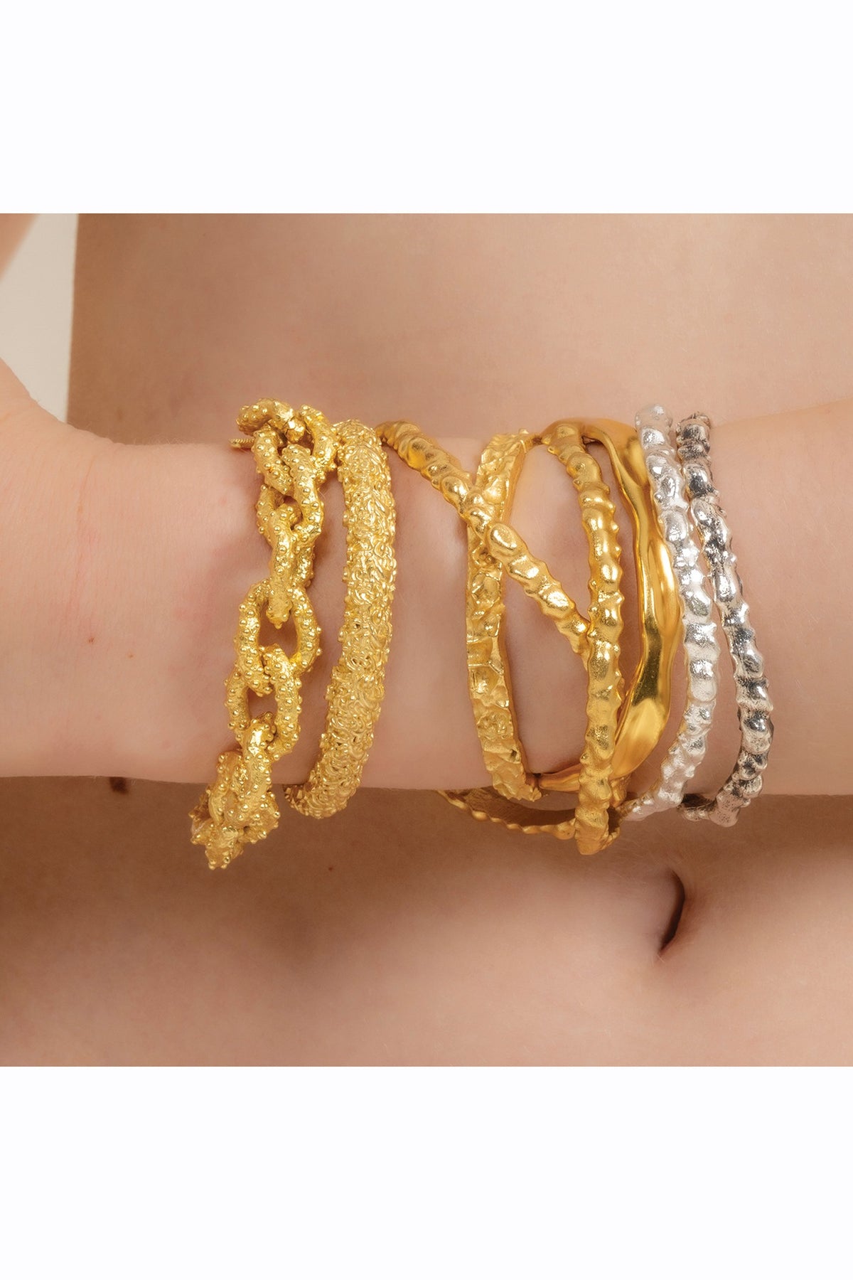 Gold Finish Textured Rowdy Bangle