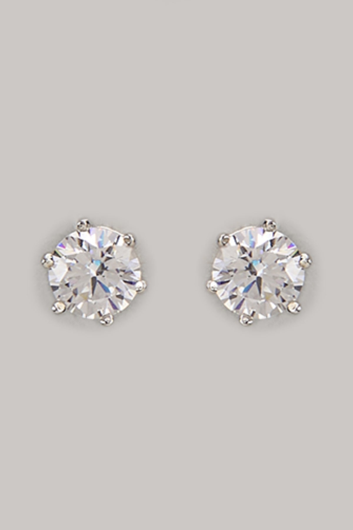 White Finish Swarovski Stud Earrings In Sterling Silver