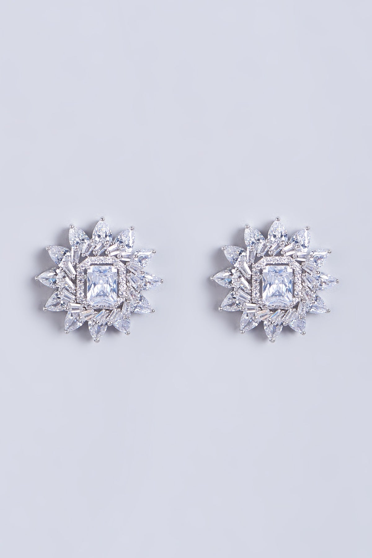 White Finish Faux Diamonds Stud Earrings In Mixed Metal