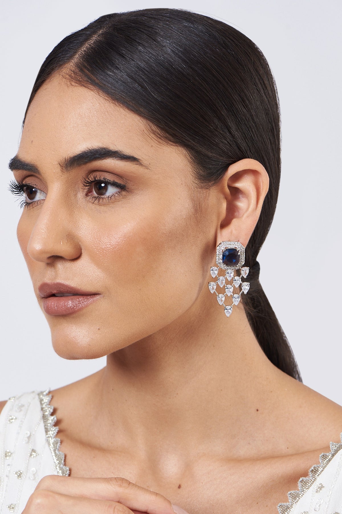 White Finish Blue Stone Dangler Earrings