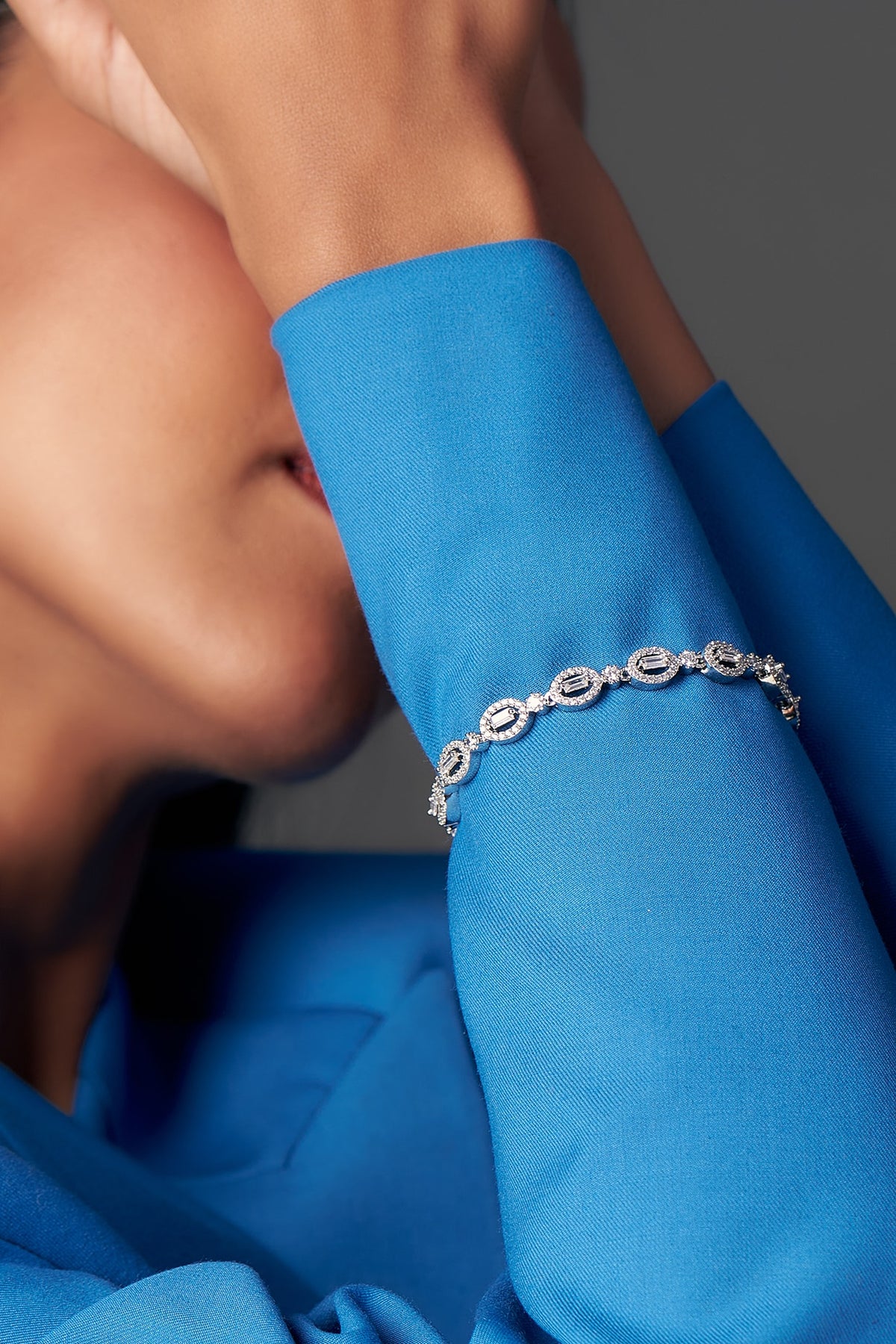 White Finish Faux Diamond Bracelet