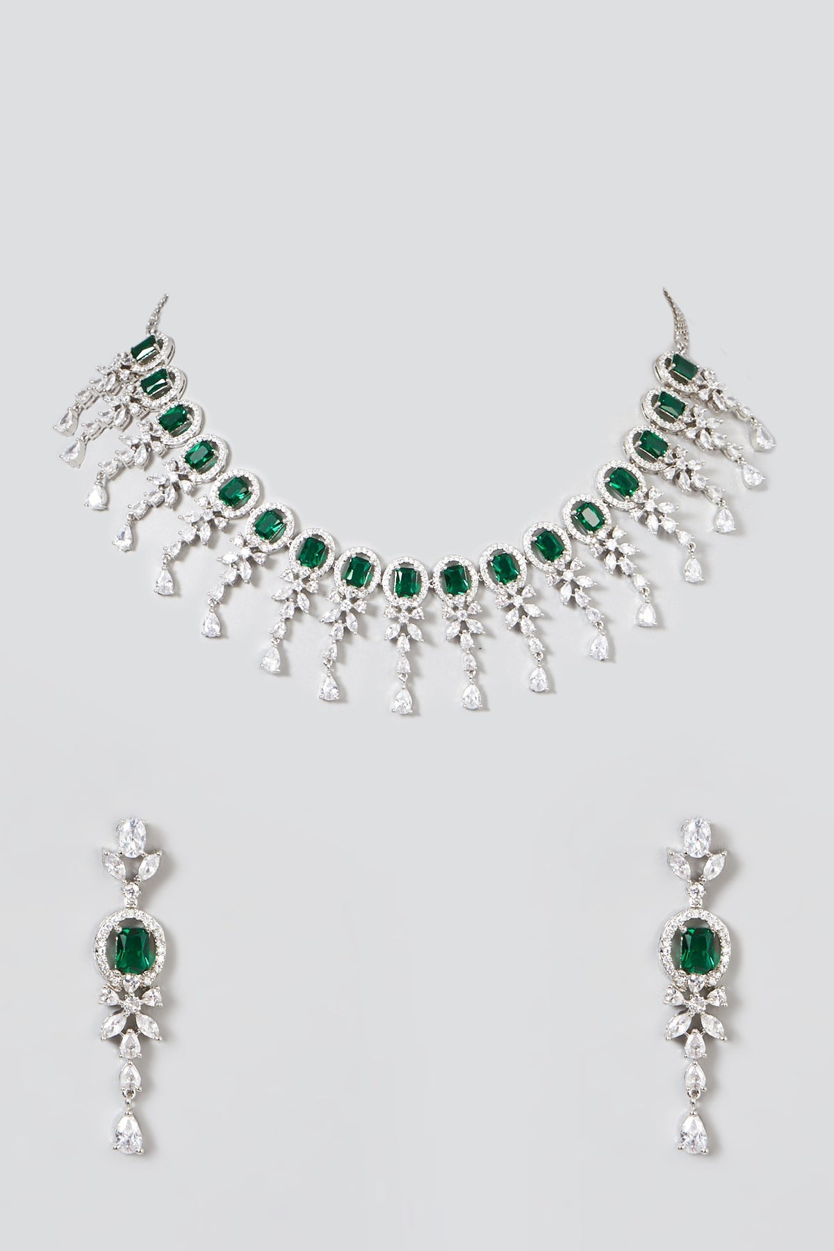 White Finish Necklace Set With Green Zircons