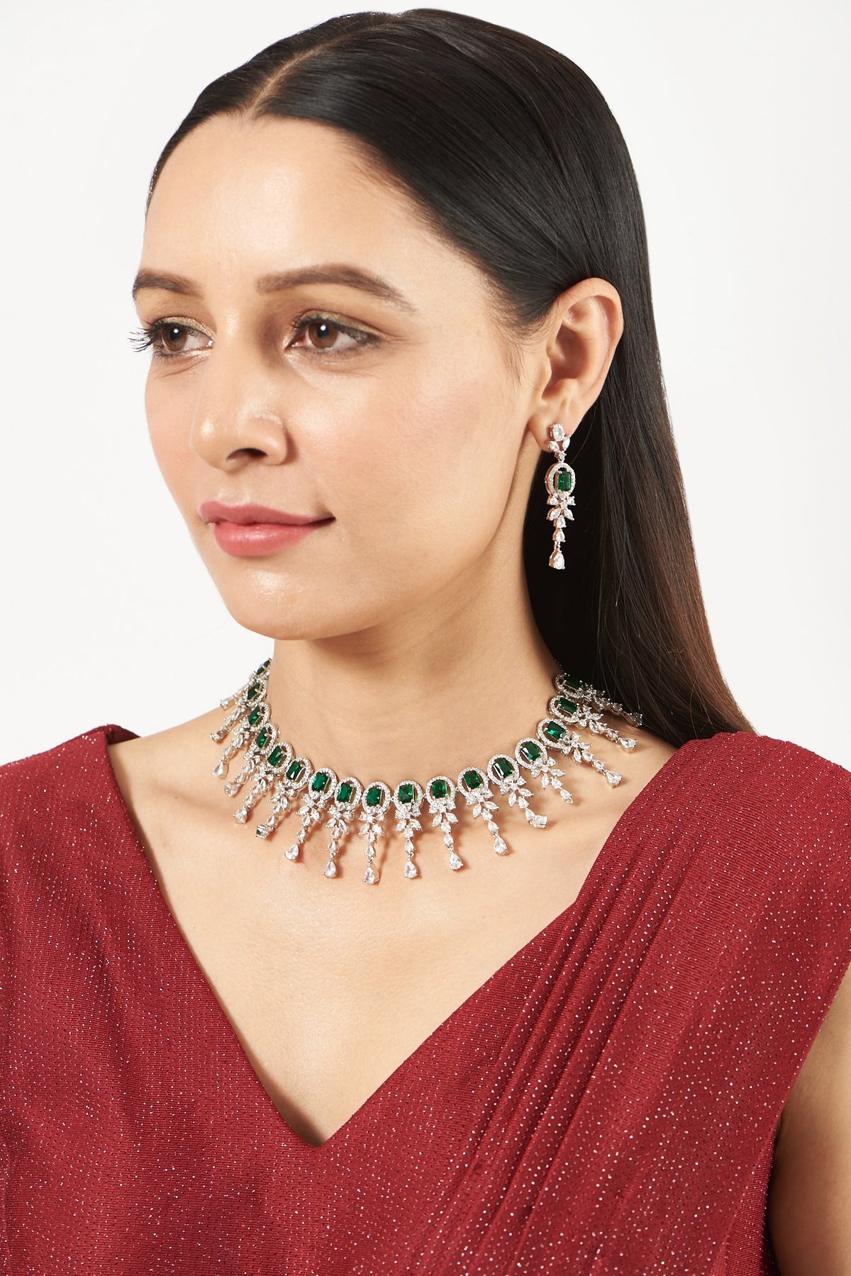 White Finish Necklace Set With Green Zircons