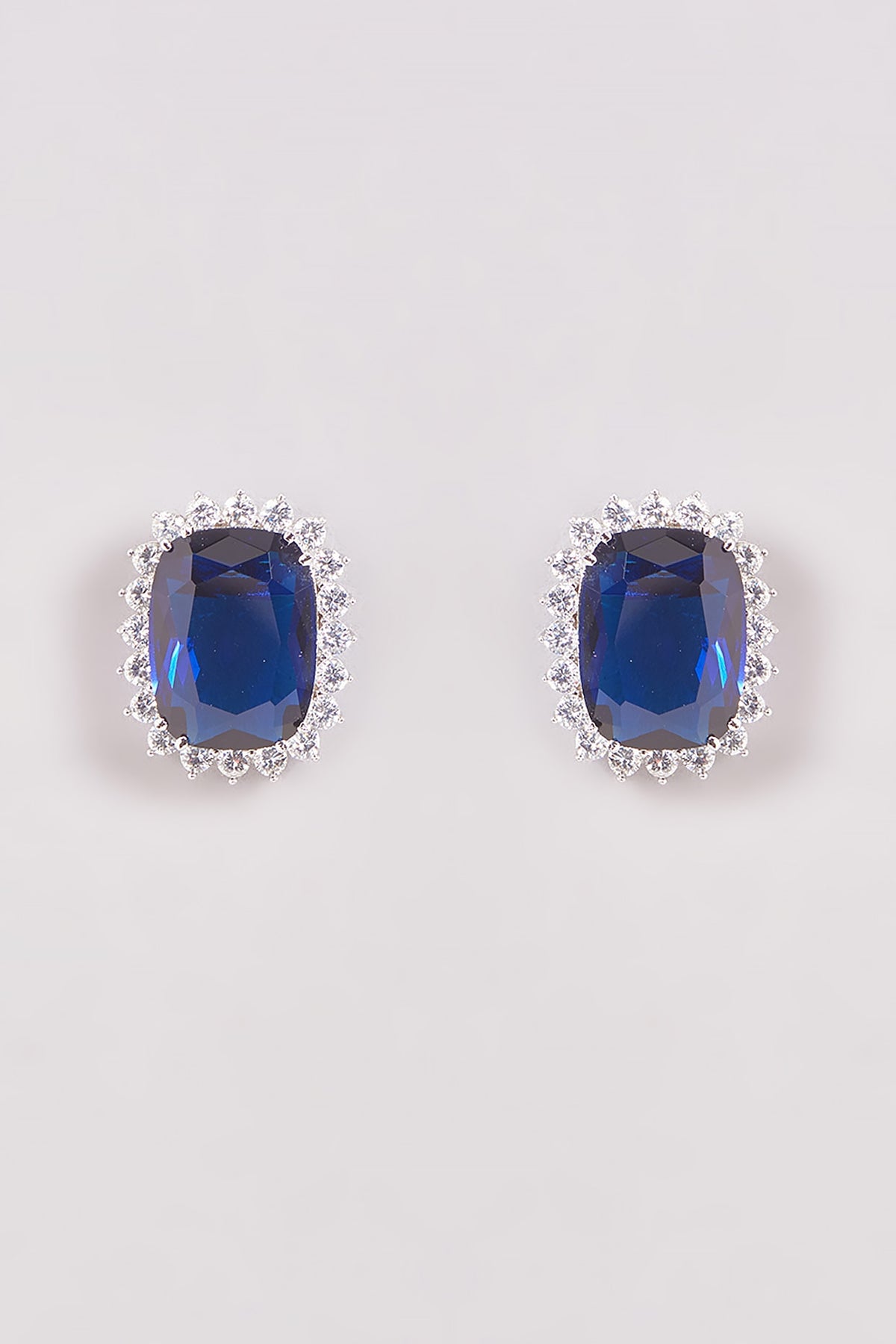 White Finish Zircon & Blue Stone Stud Earrings