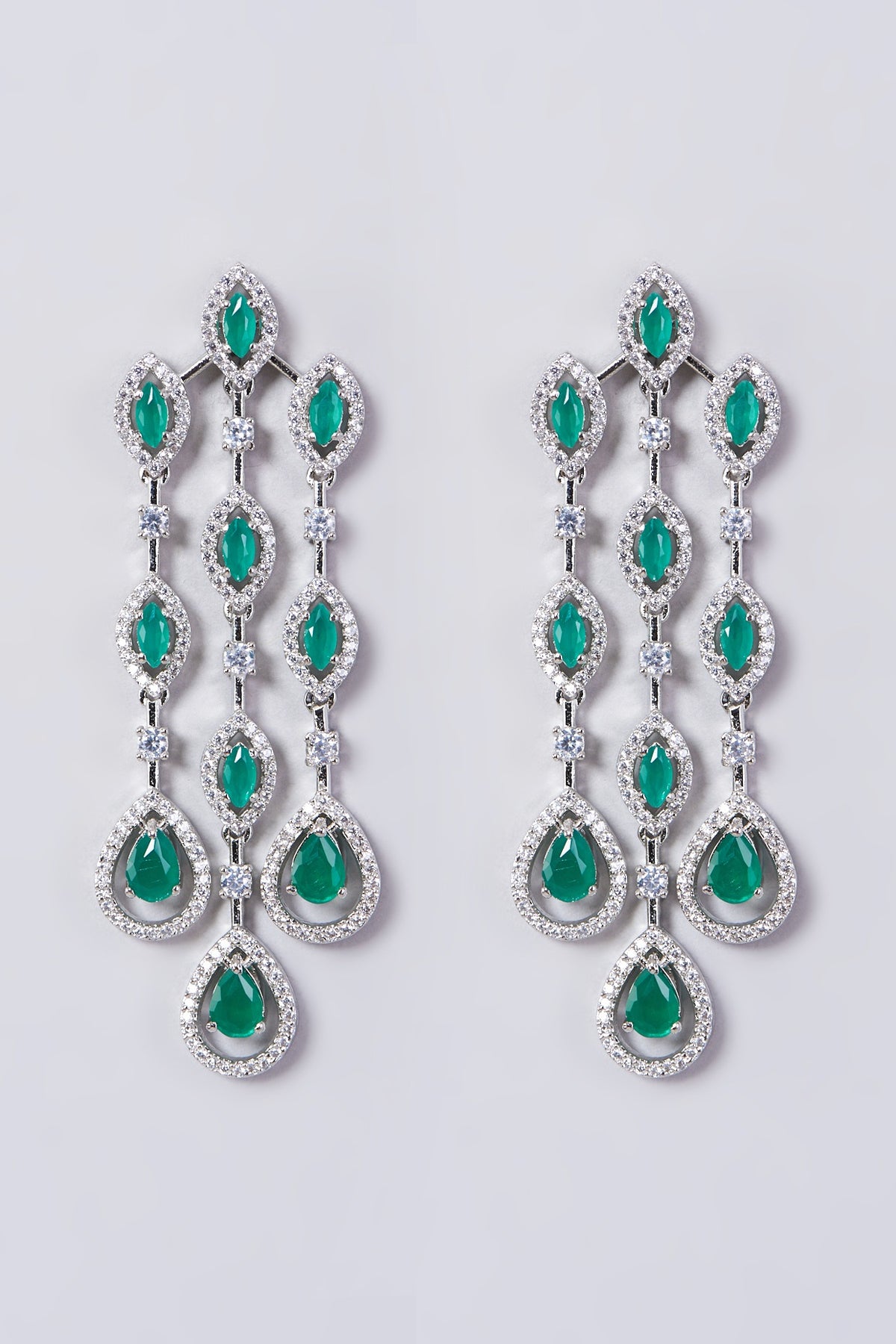 White Finish Dangler Earrings With Faux Diamonds & Zircons
