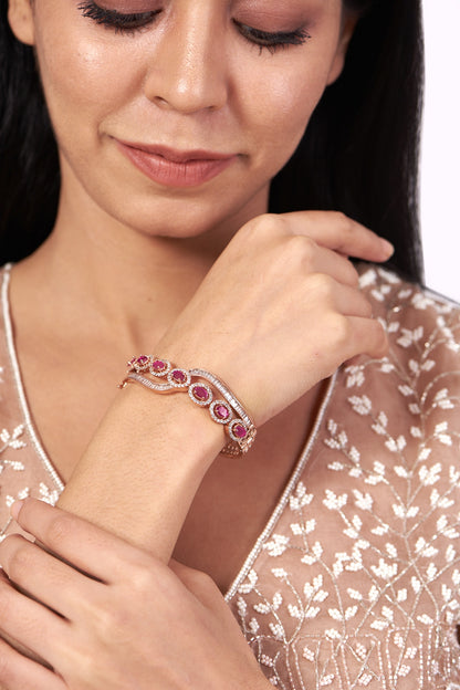 Rose Gold Finish Bangle With Pink Synthetic Stones