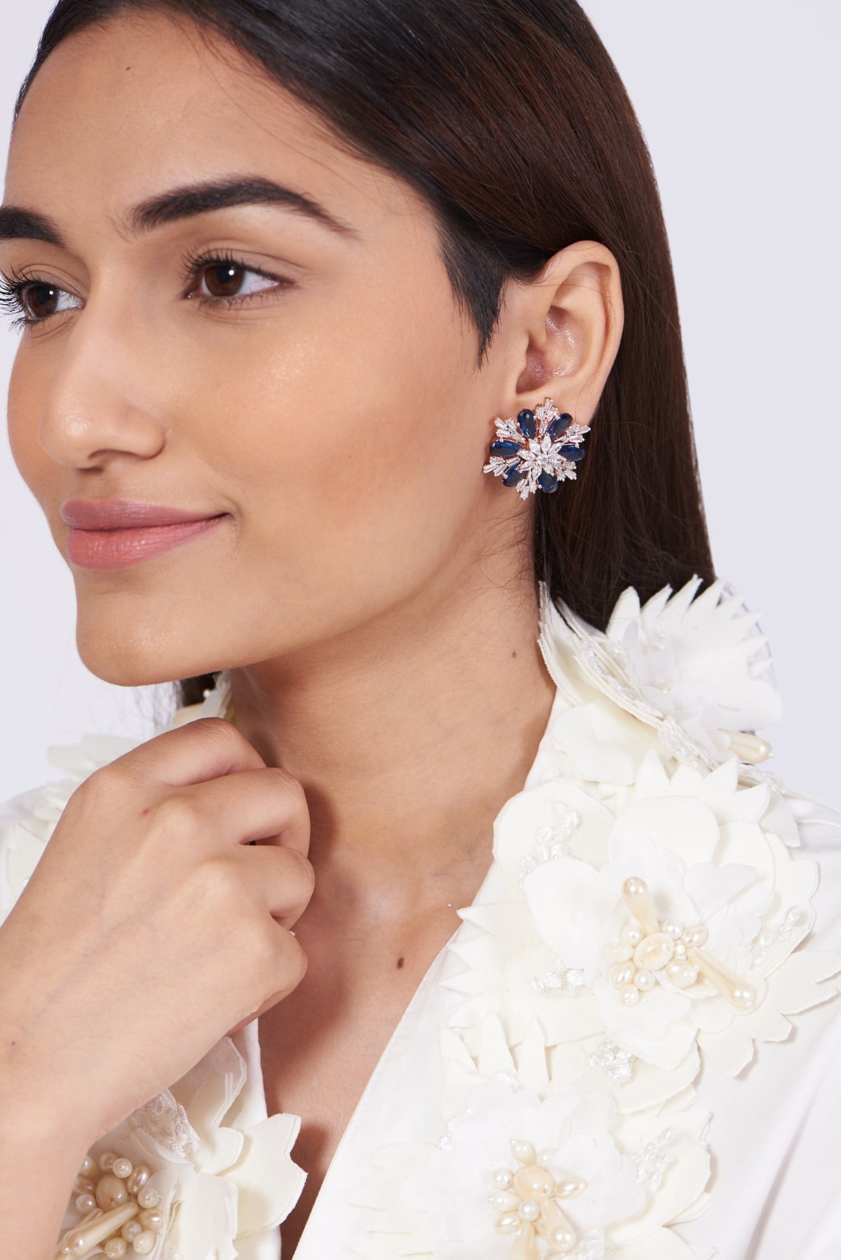 White Finish Blue Zircon Stud Earrings