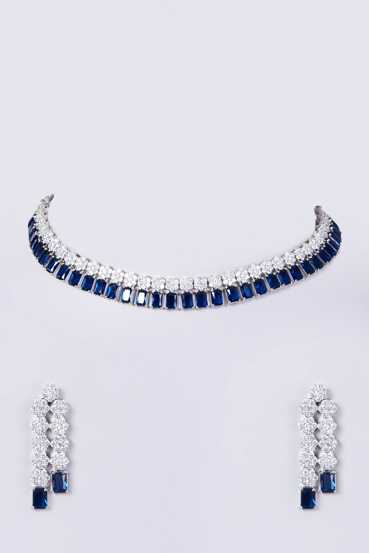 White Finish Necklace Set With Blue Zircons