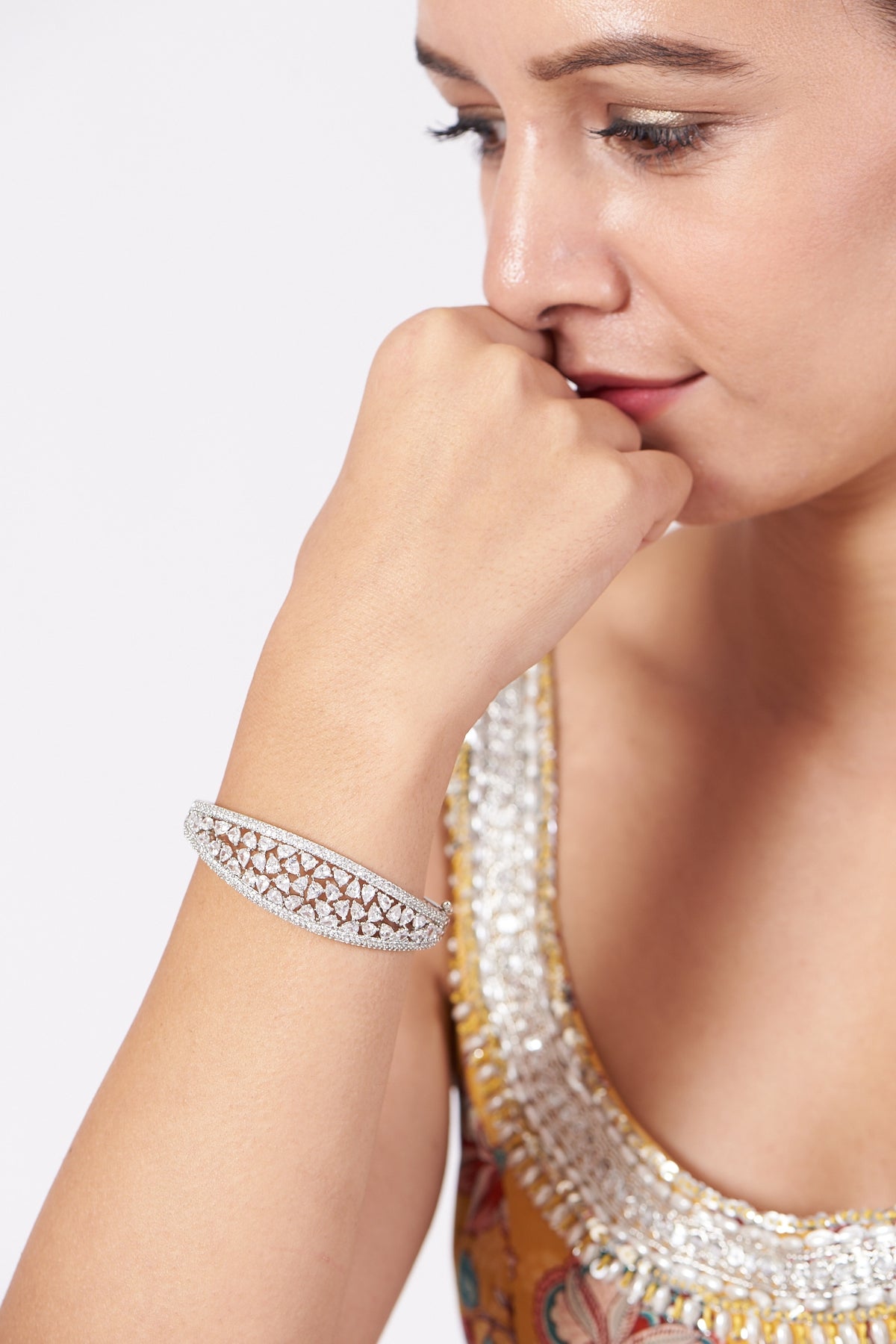White Finish Faux Diamonds Bangle