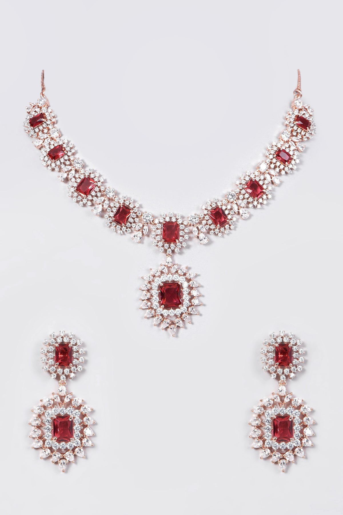 Rose Gold Finish Necklace Set With Red Stones