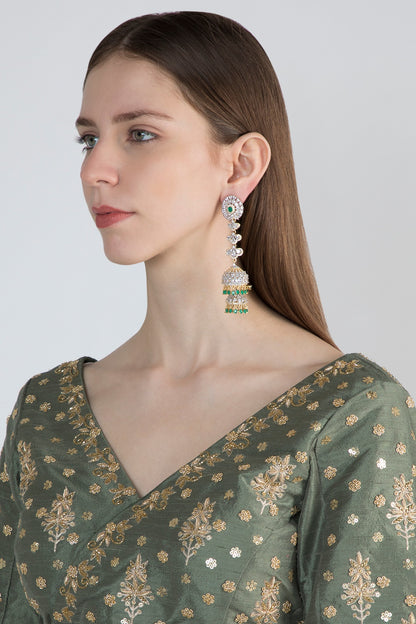 Gold Finish Long Jhumki Earrings With Green Stones