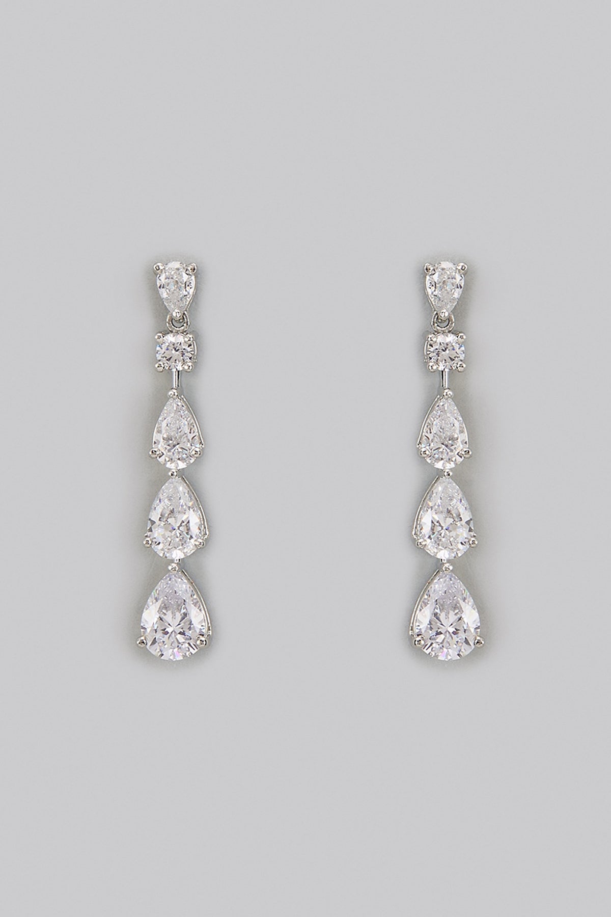 White Rhodium Finish Zircon Dangler Earrings In Sterling Silver