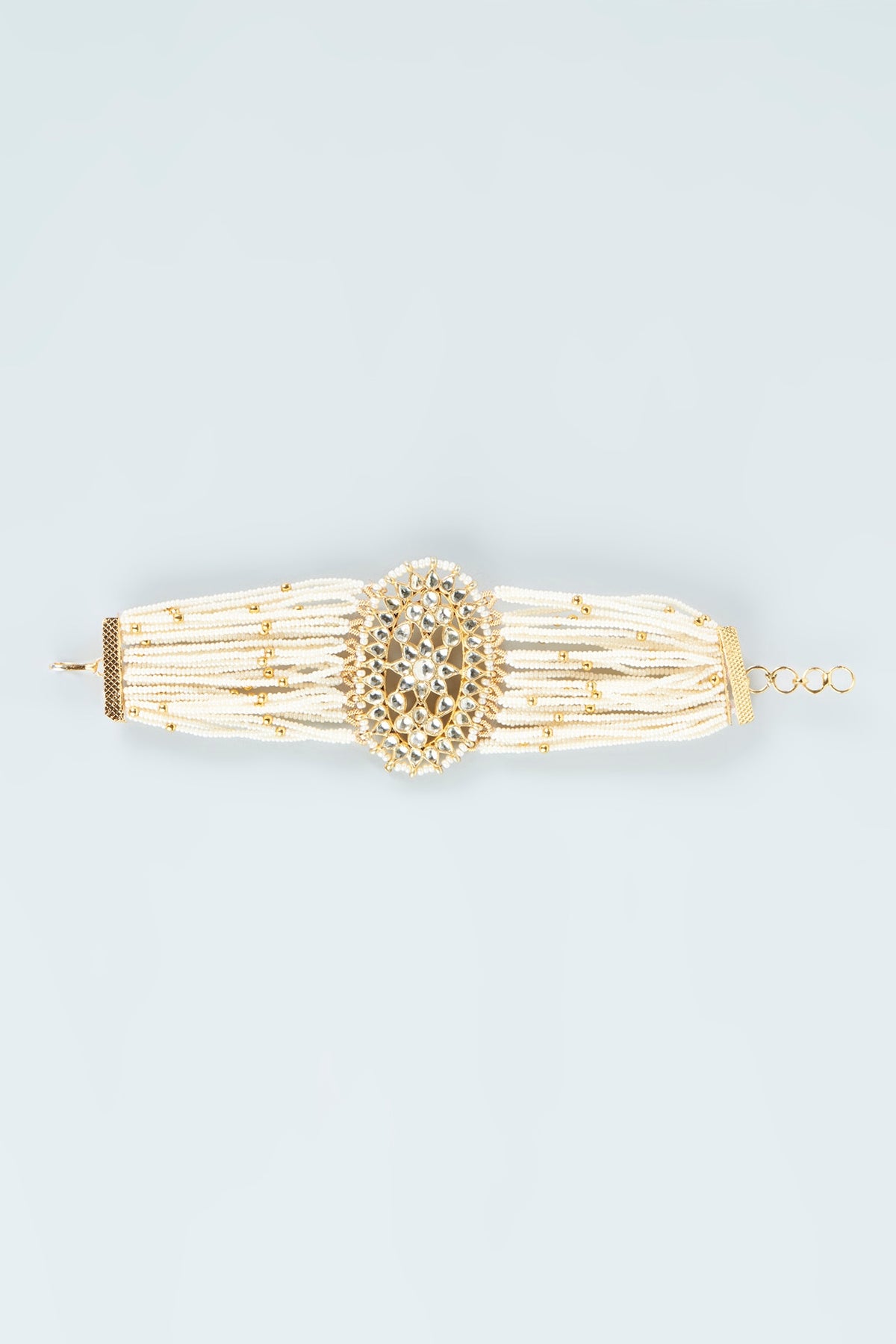 Gold Finish Bracelet With Pearl Strings
