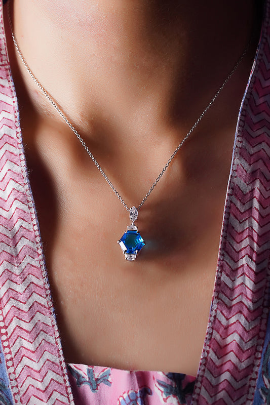 White Finish Blue Gemstone Pendant Chain Necklace In Sterling Silver