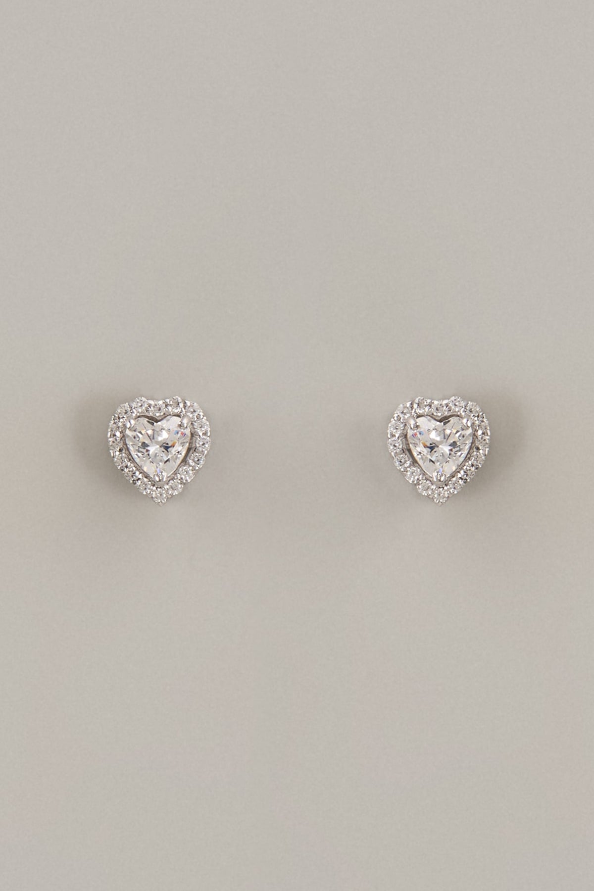 White Finish Heart Cut Swarovski Zirconia Stud Earrings In Sterling Silver