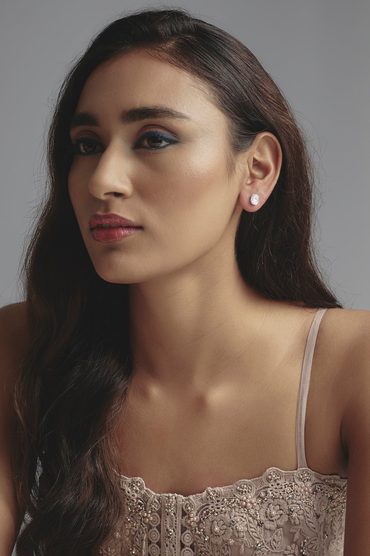 White Finish Oval Cut Swarovski Zirconia Stud Earrings In Sterling Silver