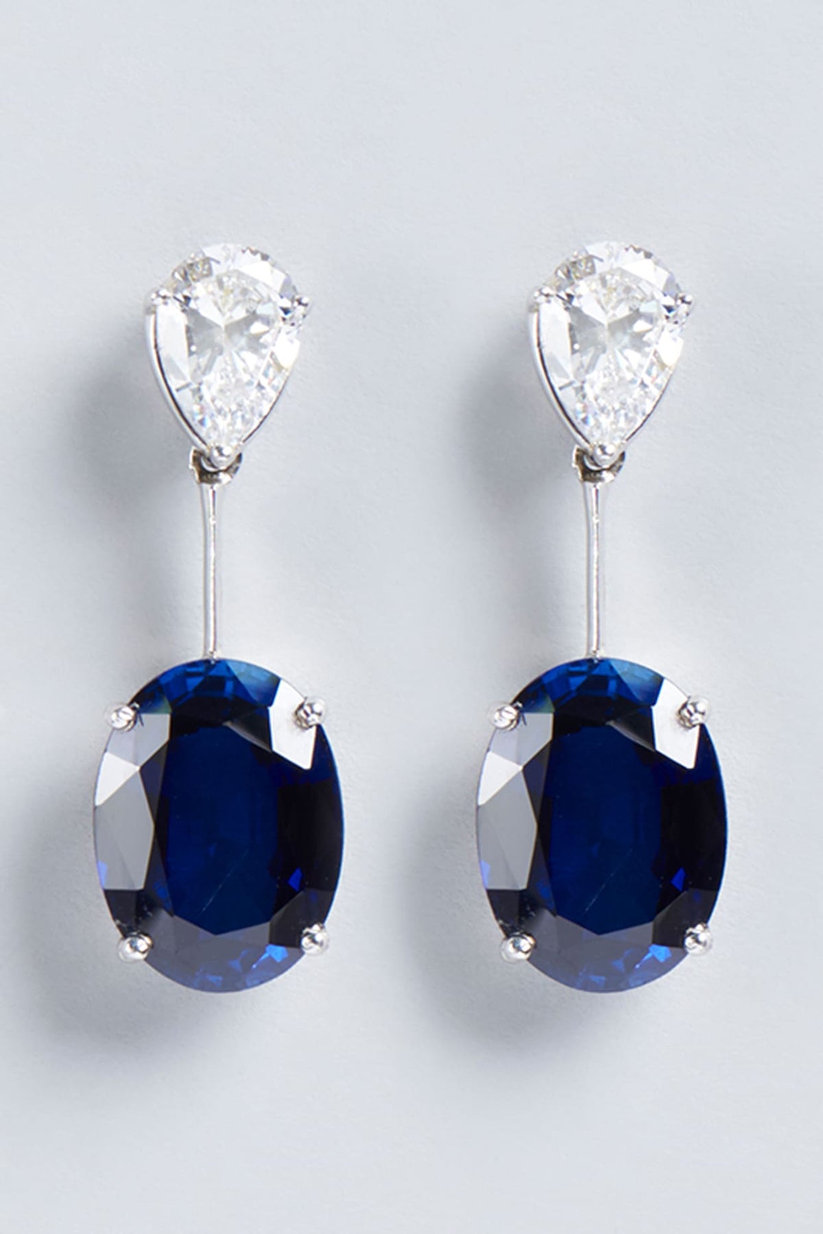 White Finish Oval Swarovski Zirconia Earrings In Sterling Silver
