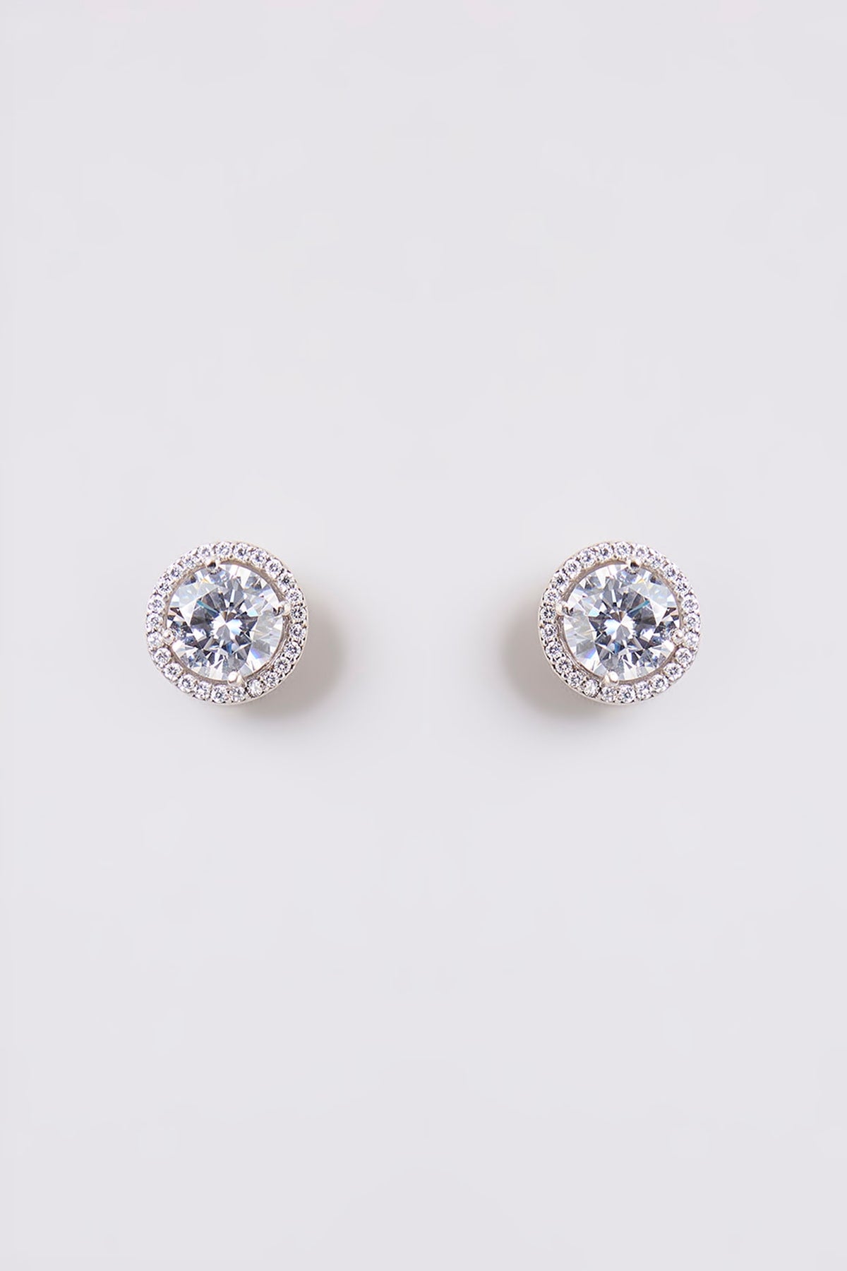 White Finish White Stone Stud Earrings In Sterling Silver