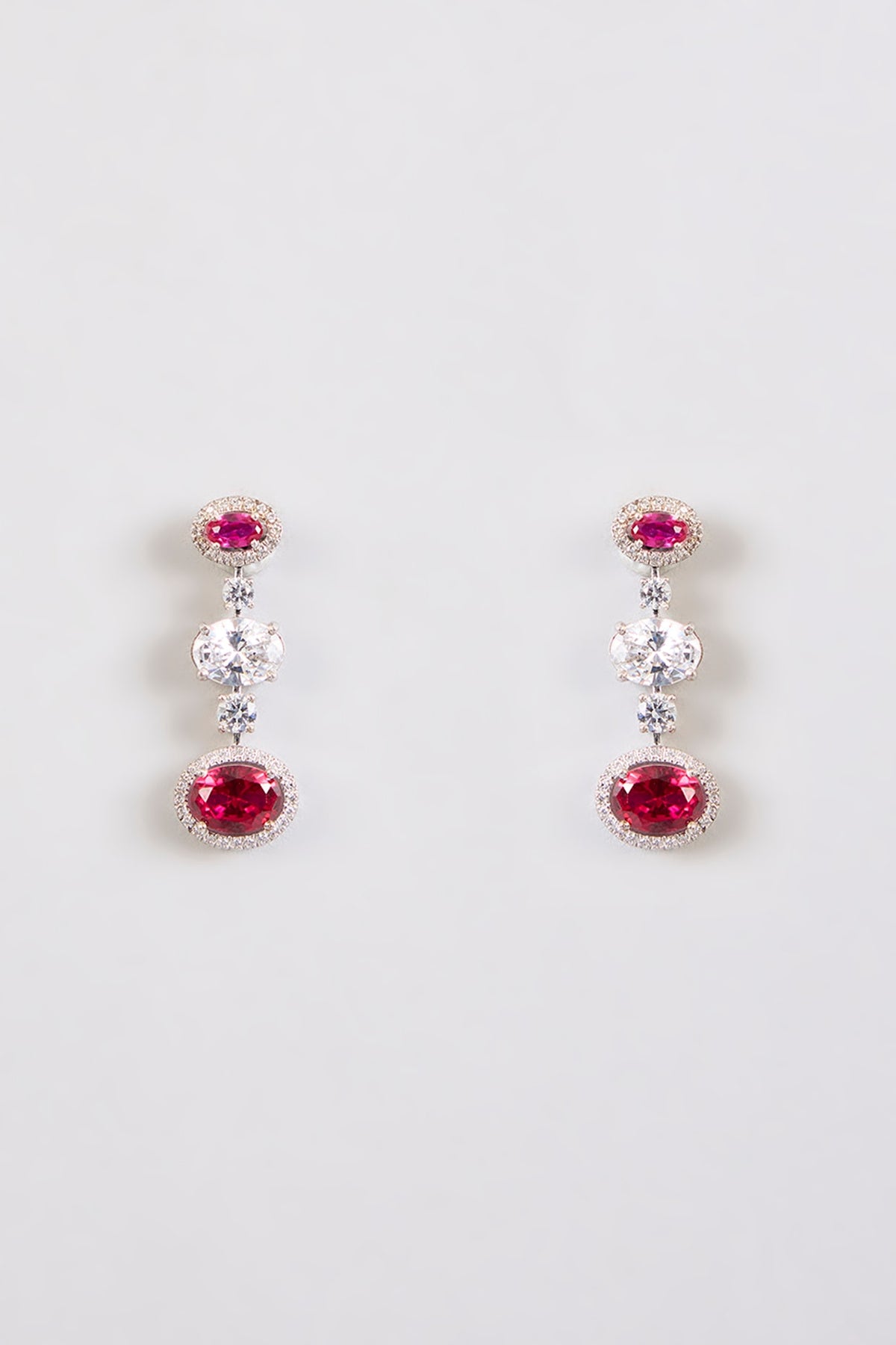 White Finish Zircon & Red Stone Dangler Earrings In Sterling Silver